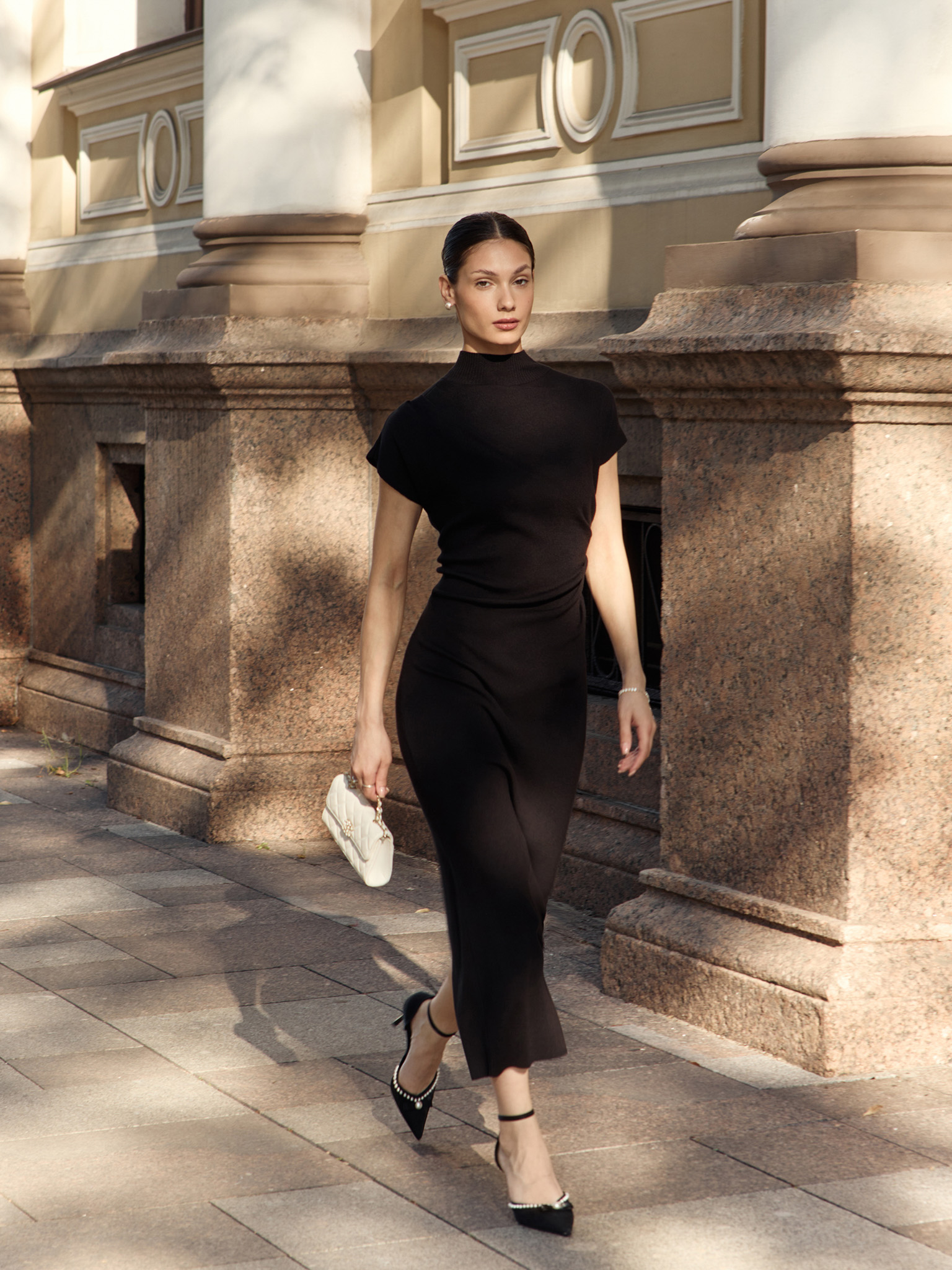 Knitted midi dress with stand-up collar and asymmetric gathers