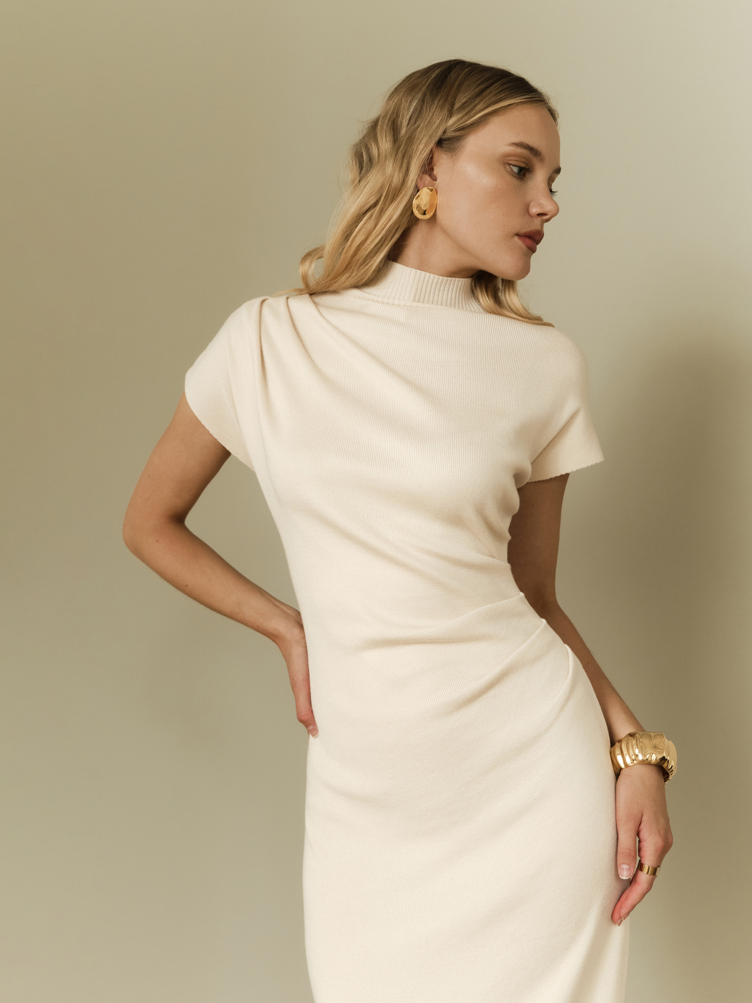 Knitted midi dress with stand-up collar and asymmetric gathers