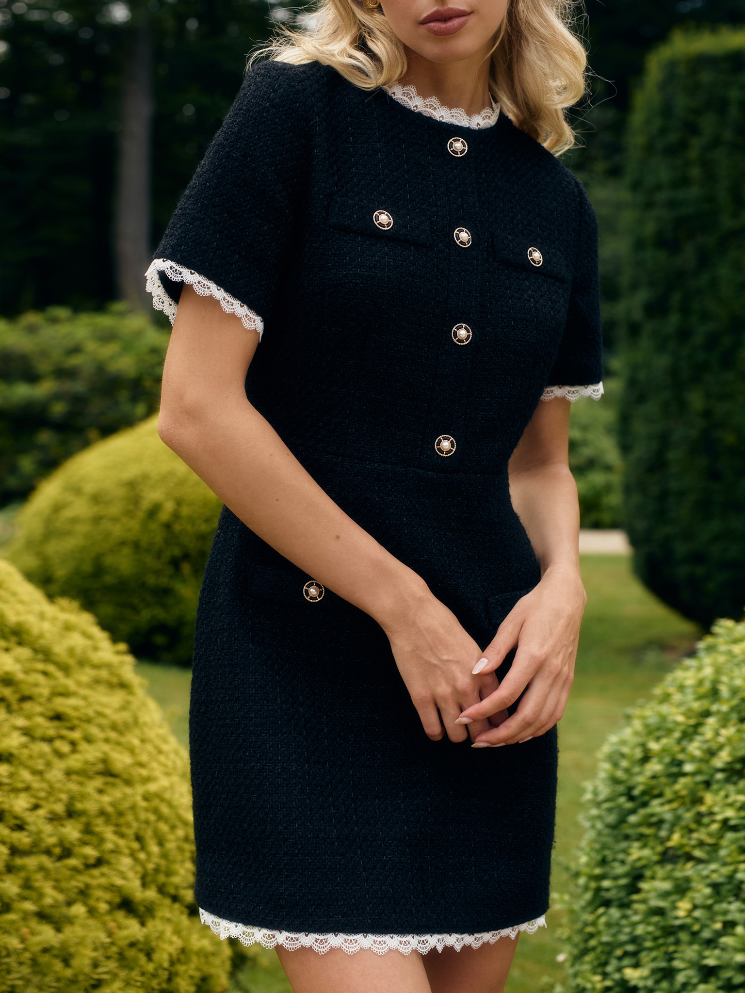 Tweed mini dress with openwork inserts