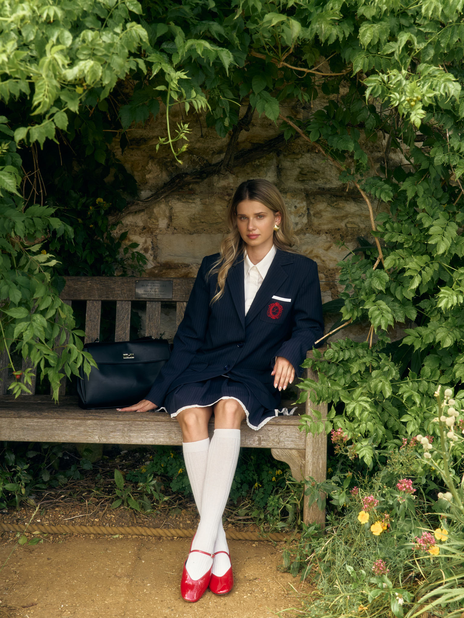 Single-breasted striped jacket with contrasting embroidery on the placket