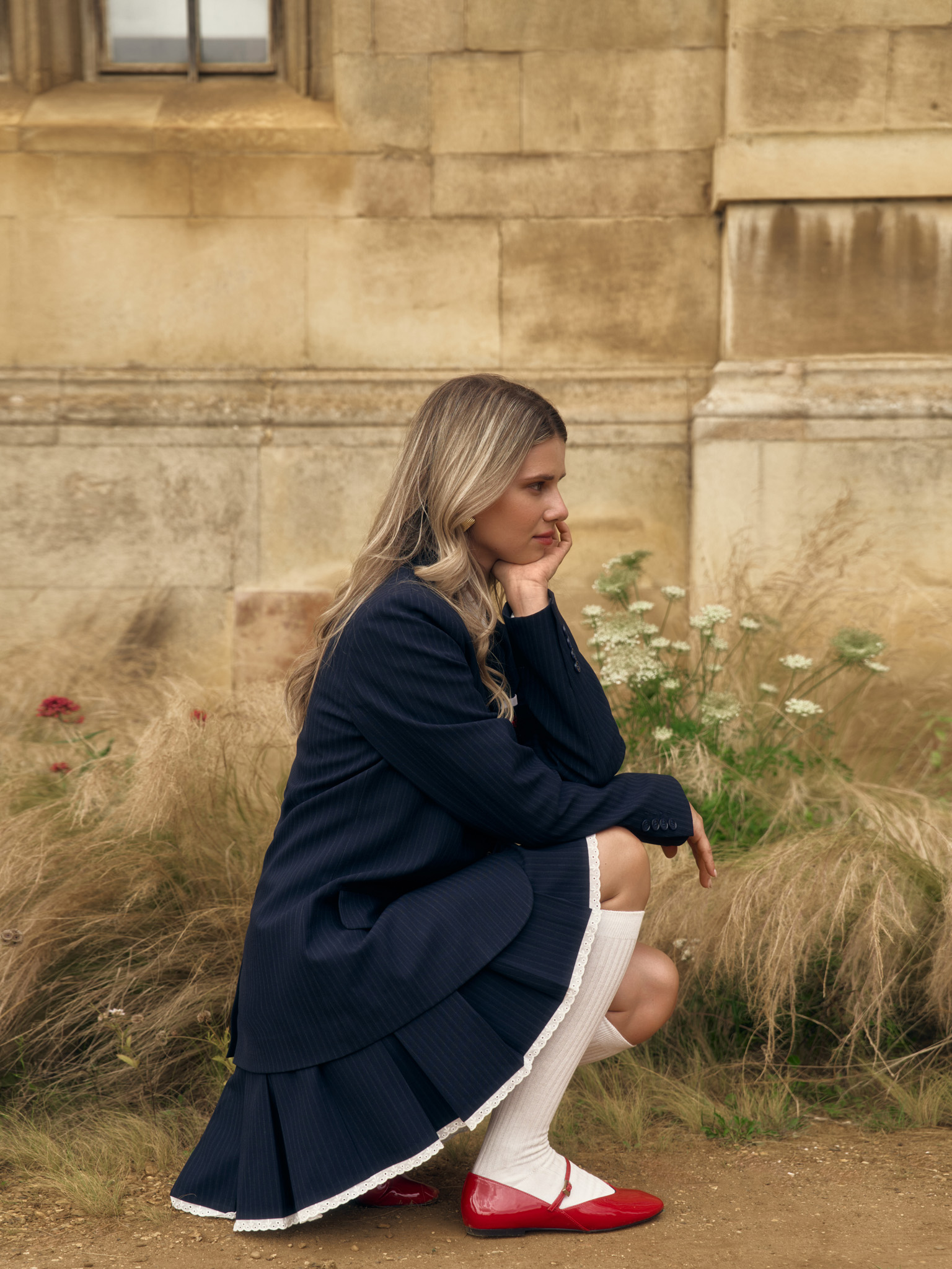 Single-breasted striped jacket with contrasting embroidery on the placket