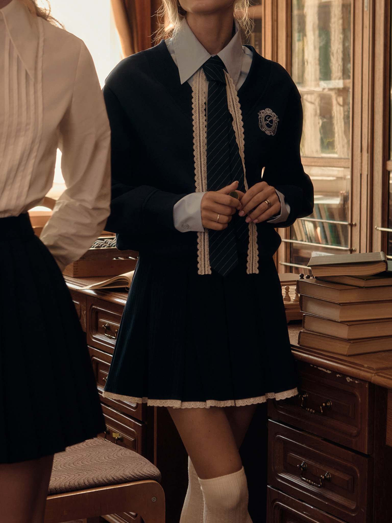 Mini striped skirt with openwork braid on the edge