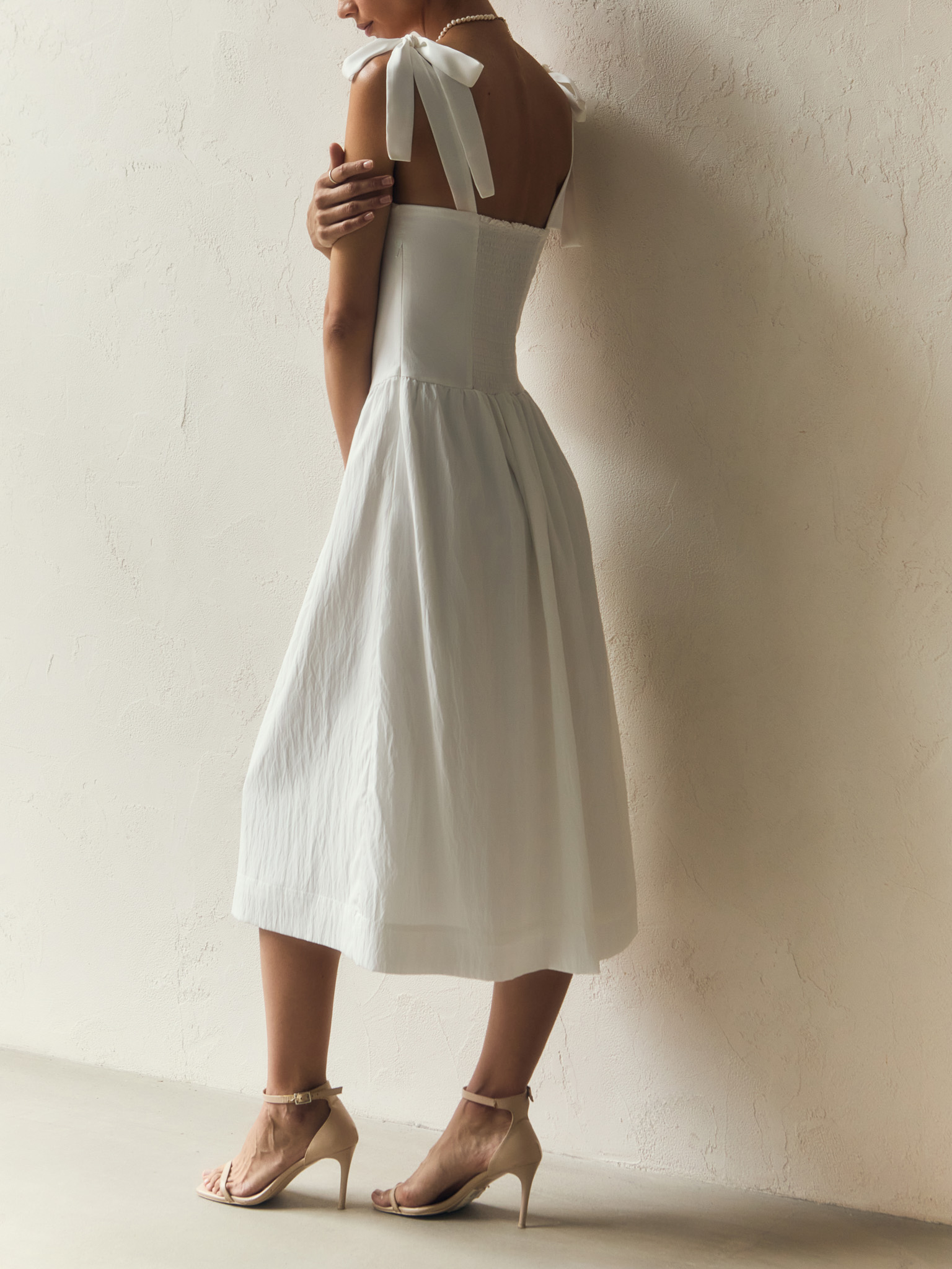 Midi dress with draped chest and ribbon straps
