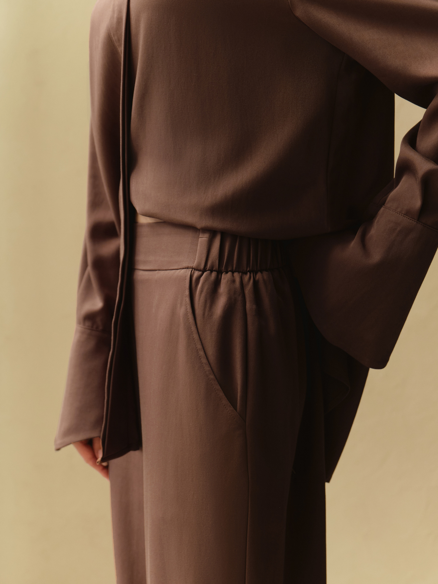 Straight trousers with elasticated waistband