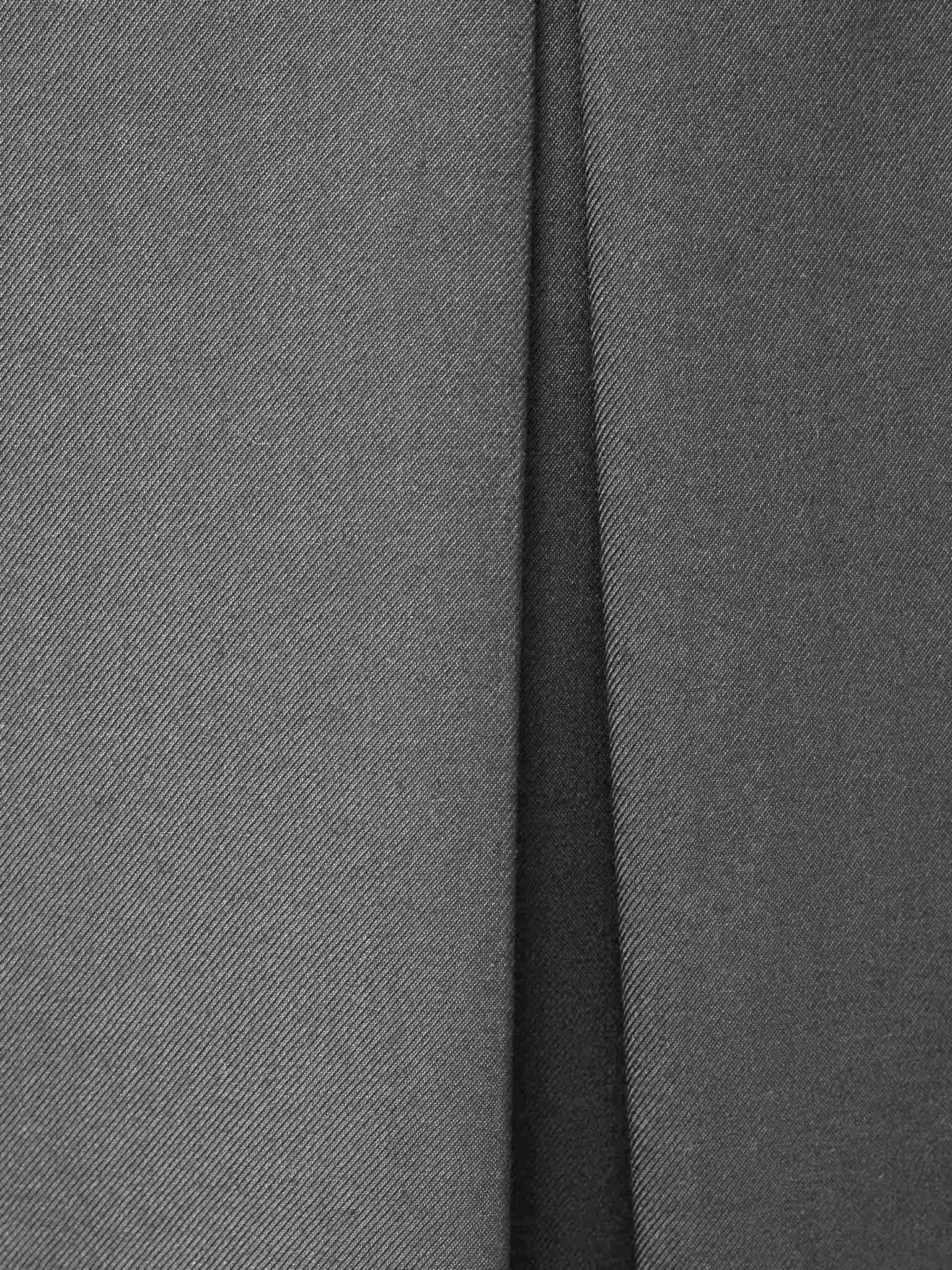 Mini pleated skirt with eco-leather belt