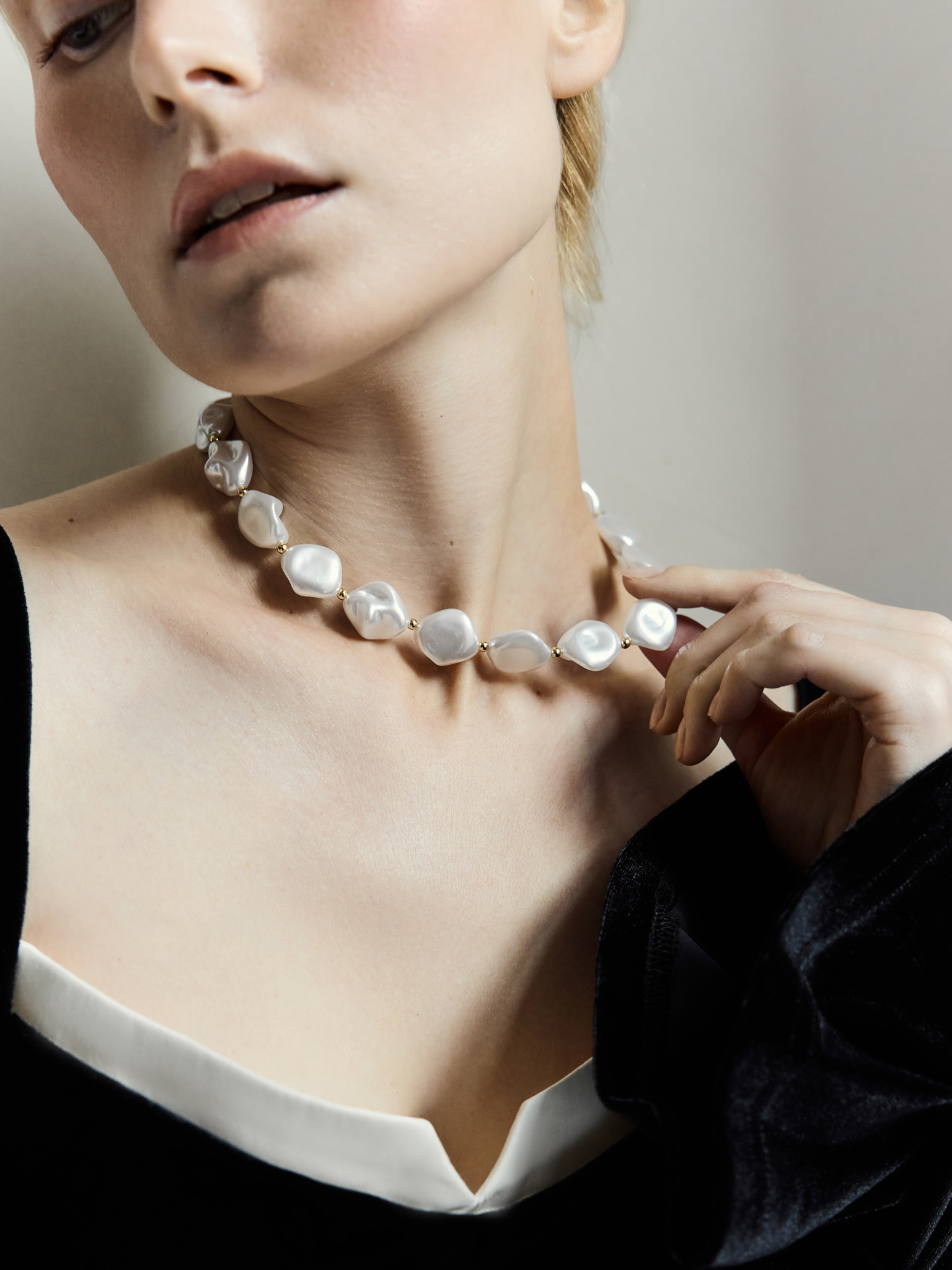 Golden flat pearl necklace