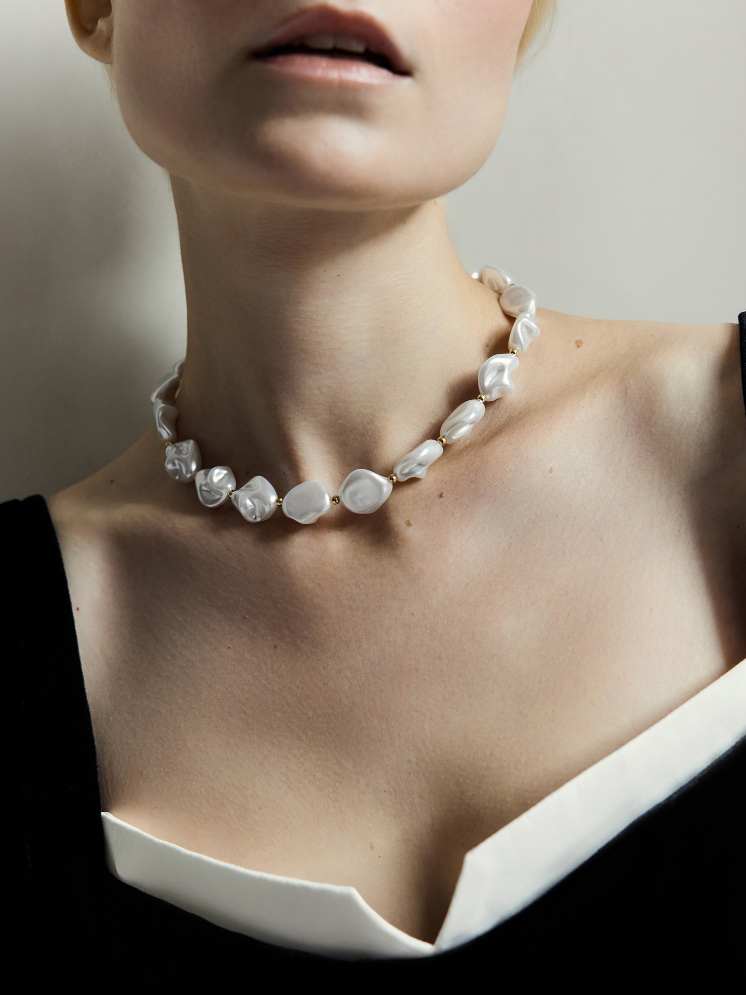 Golden flat pearl necklace