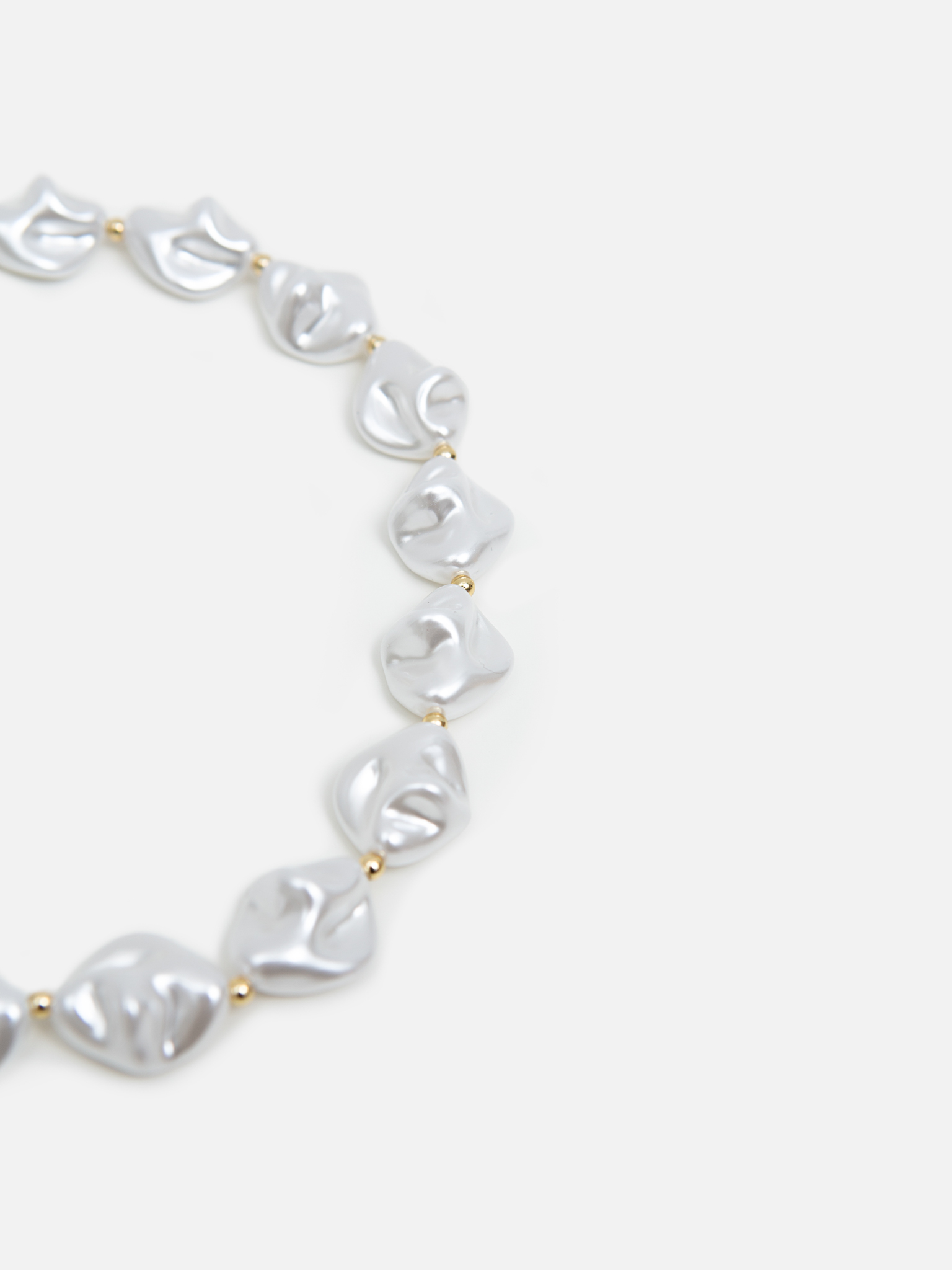 Golden flat pearl necklace