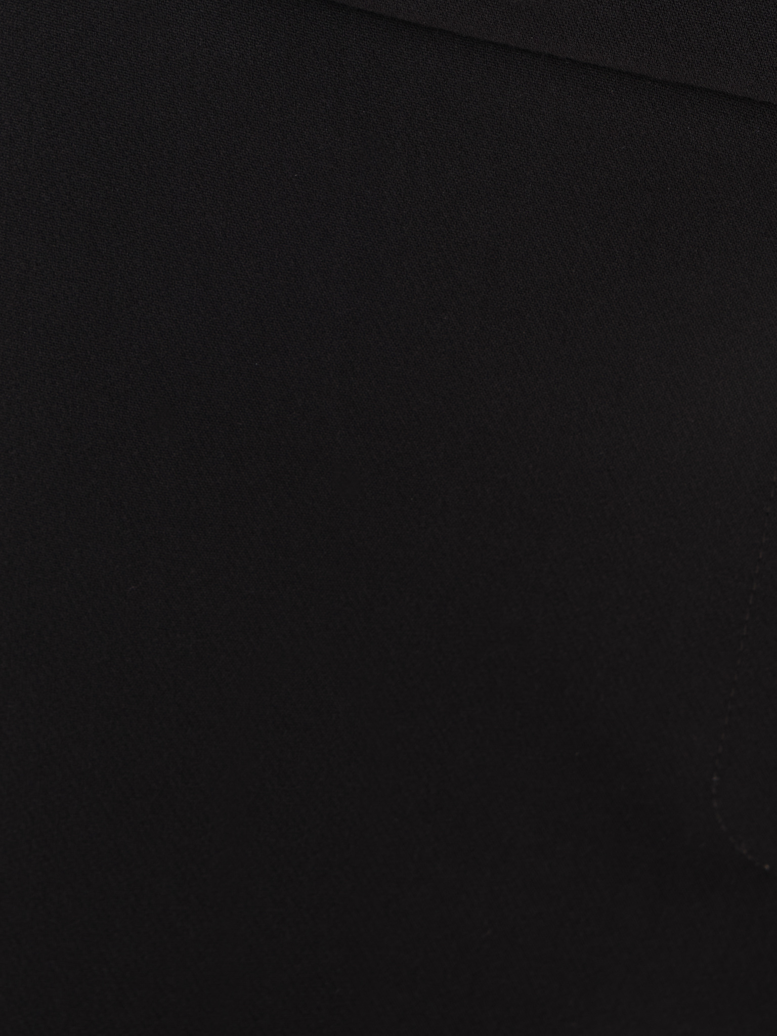 Flared trousers with stitched crease