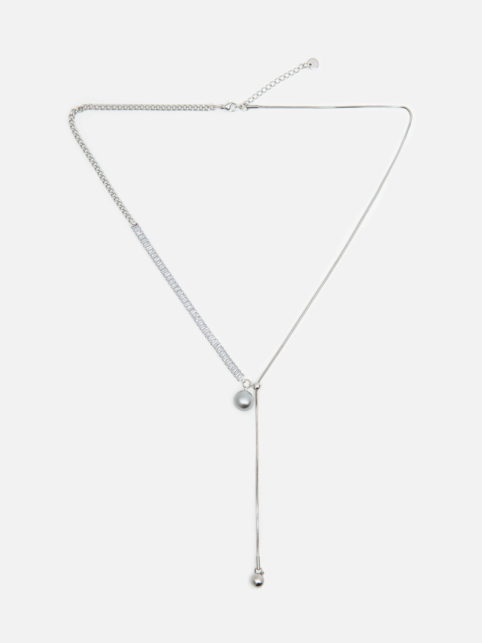 Long necklace with rhinestones and round decoration