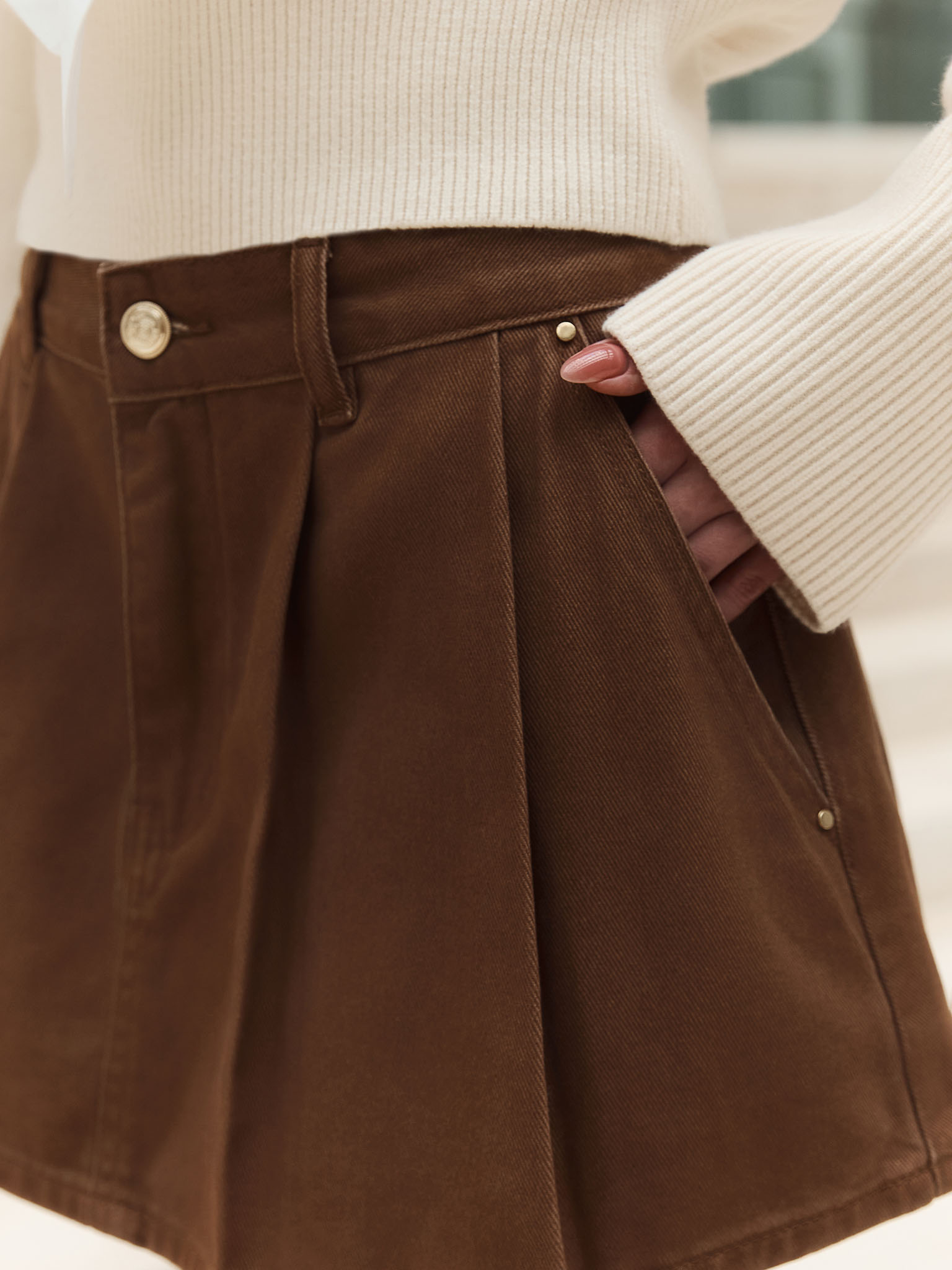 Mini denim skirt with pleats