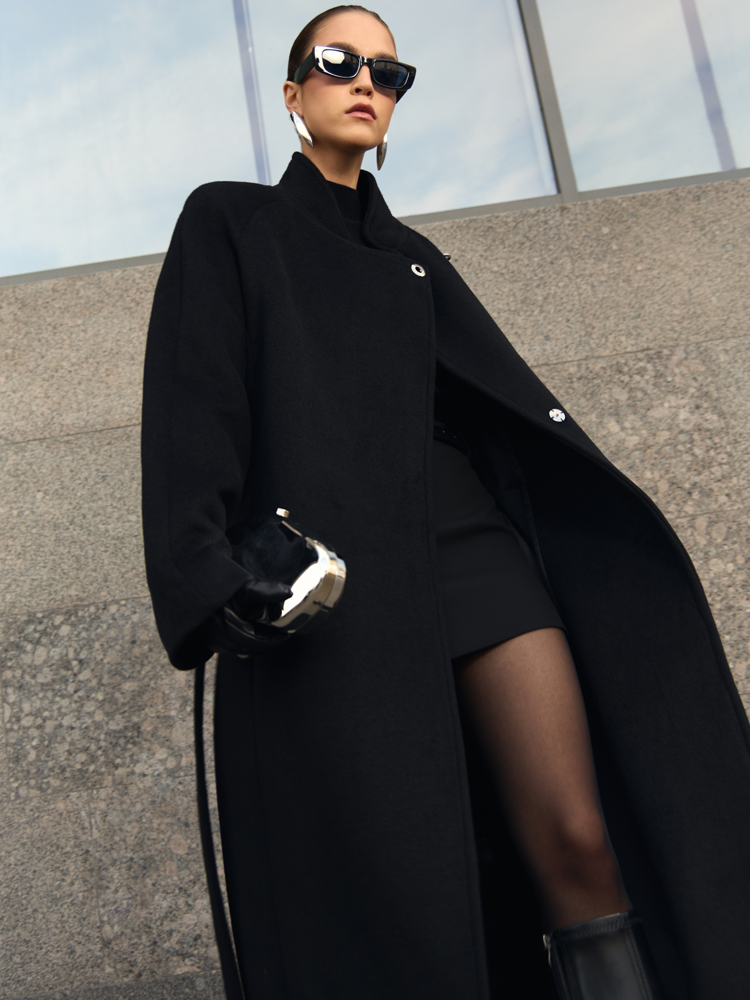 Woollen maxi coat with metal clasp at the shoulder