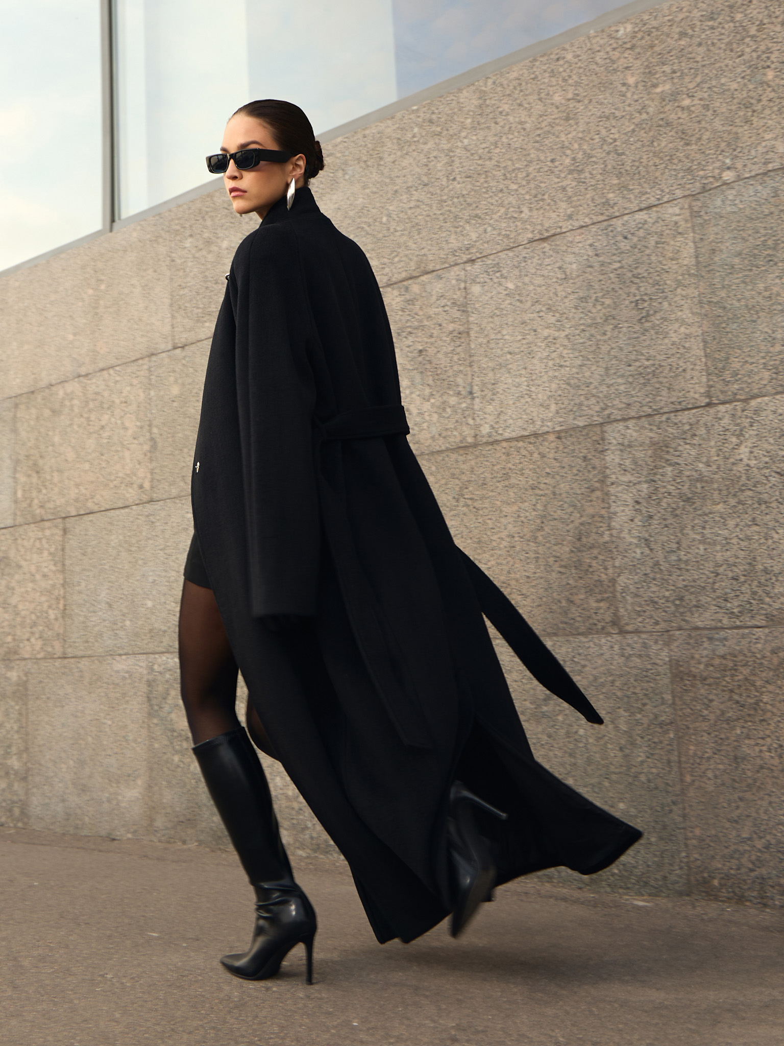 Woollen maxi coat with metal clasp at the shoulder