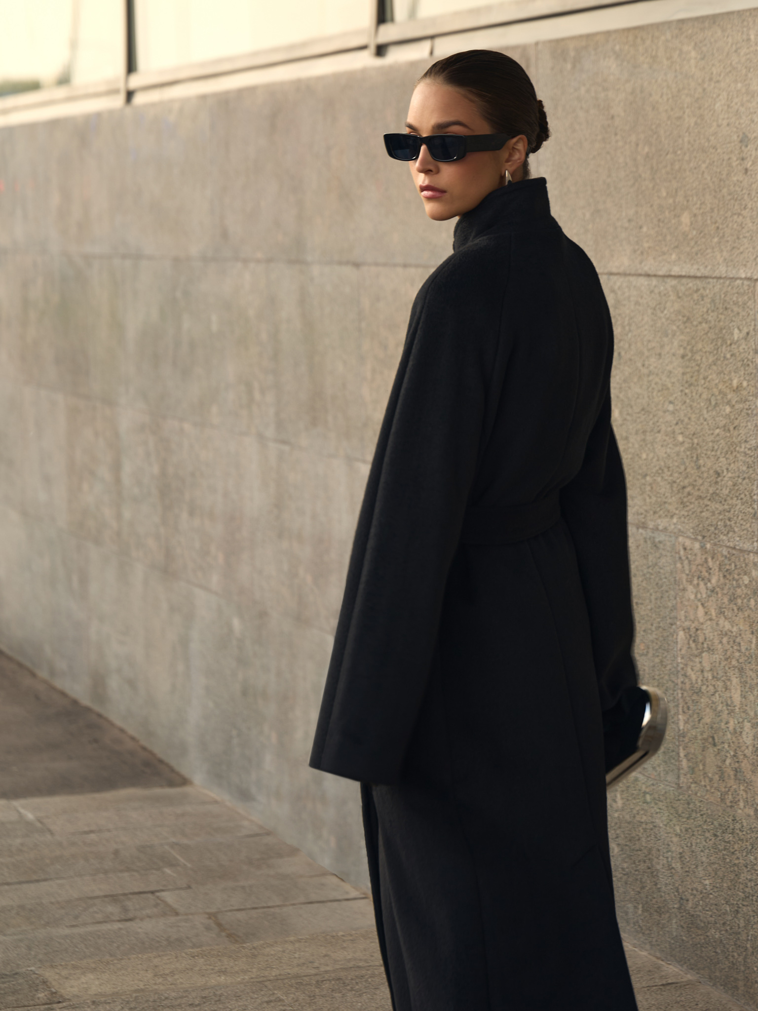 Woollen maxi coat with metal clasp at the shoulder