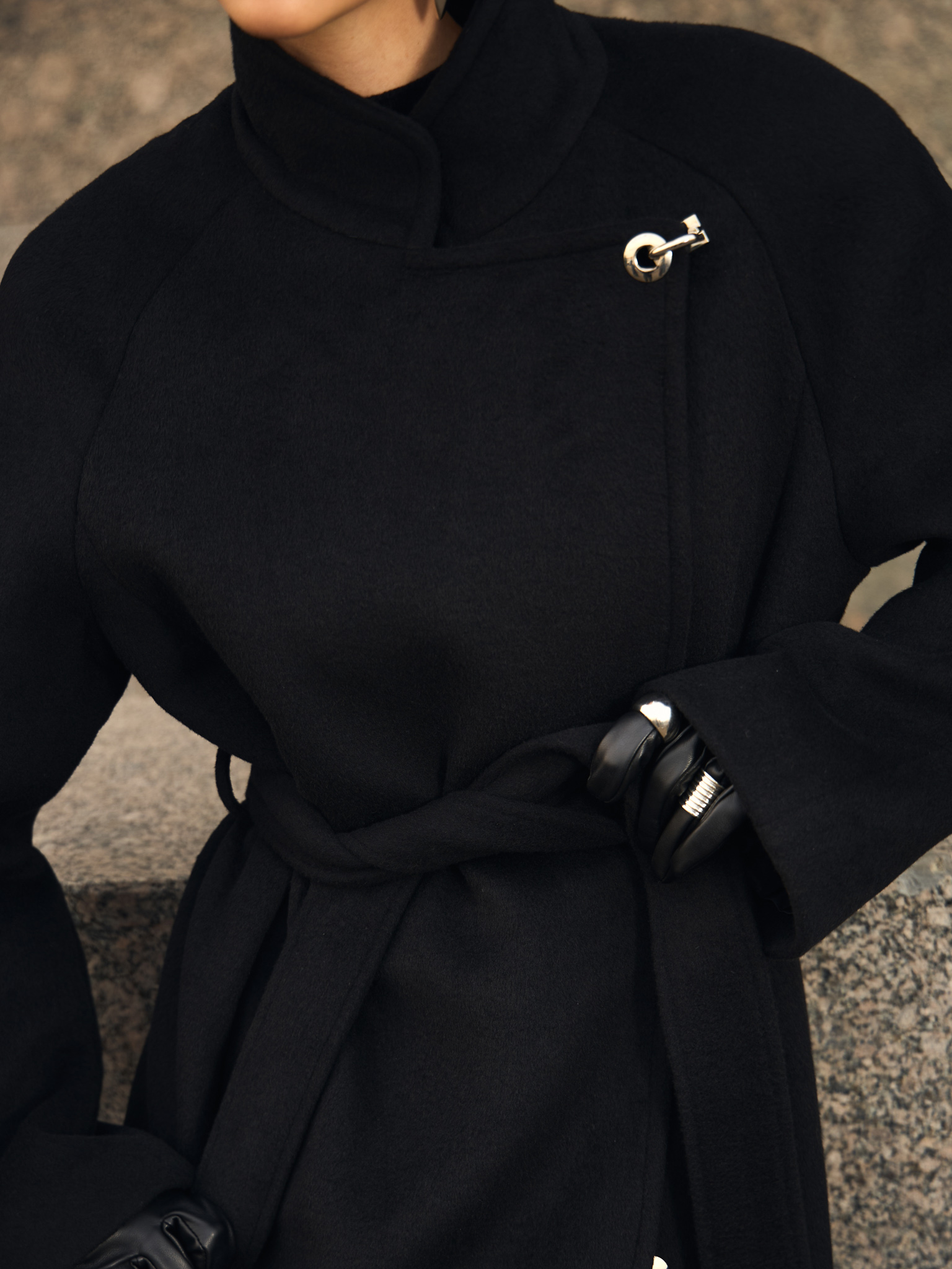 Woollen maxi coat with metal clasp at the shoulder