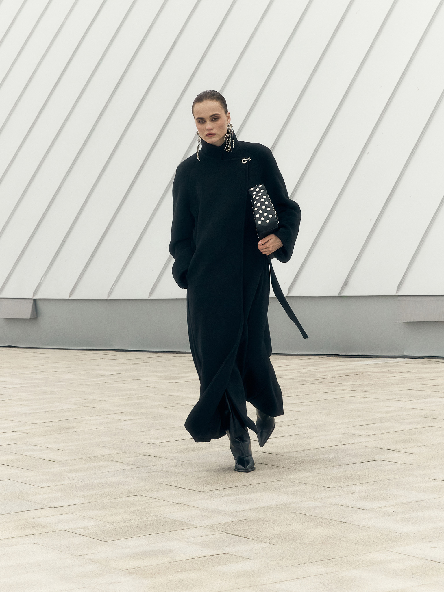 Woollen maxi coat with metal clasp at the shoulder