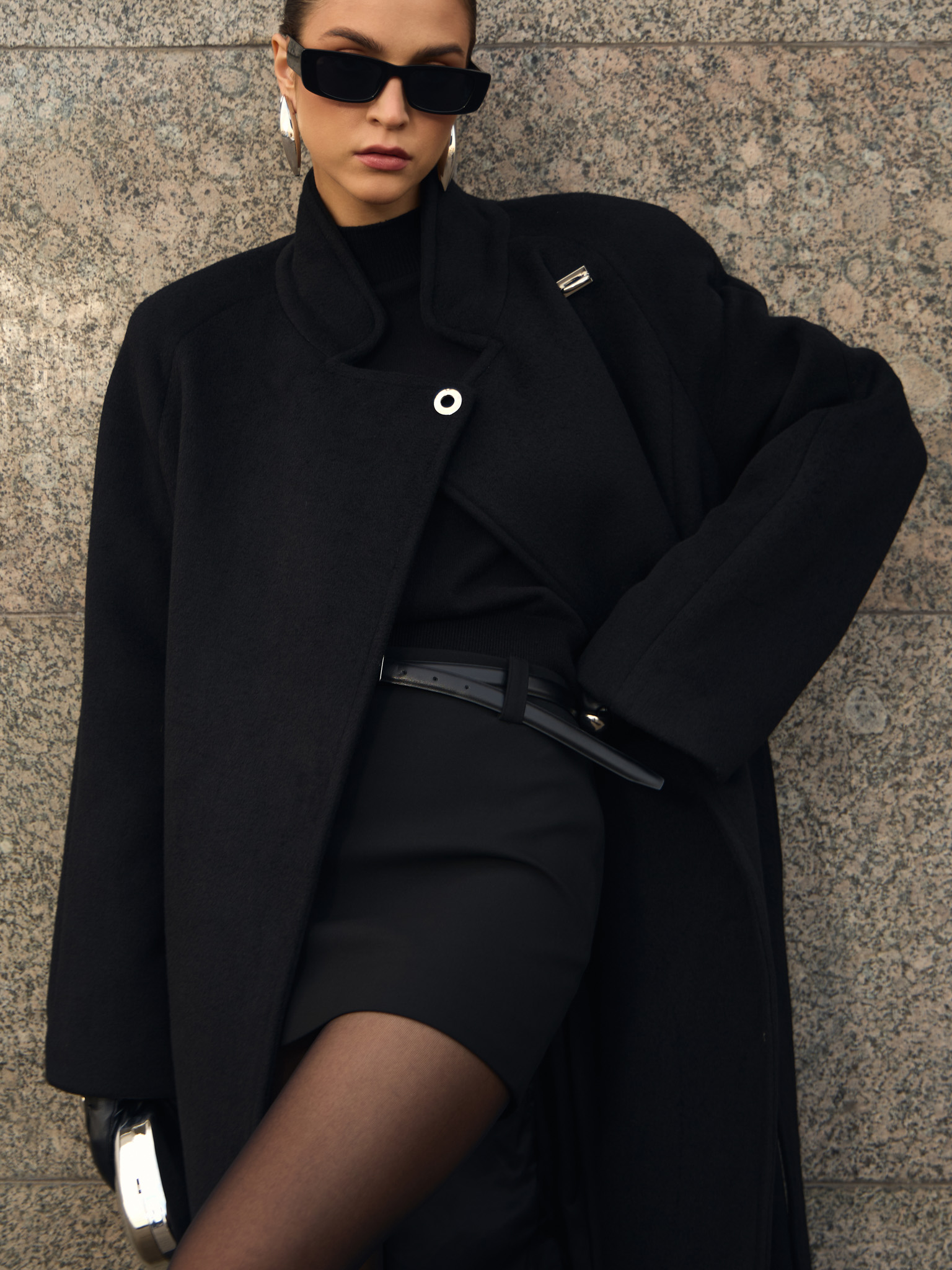 Woollen maxi coat with metal clasp at the shoulder