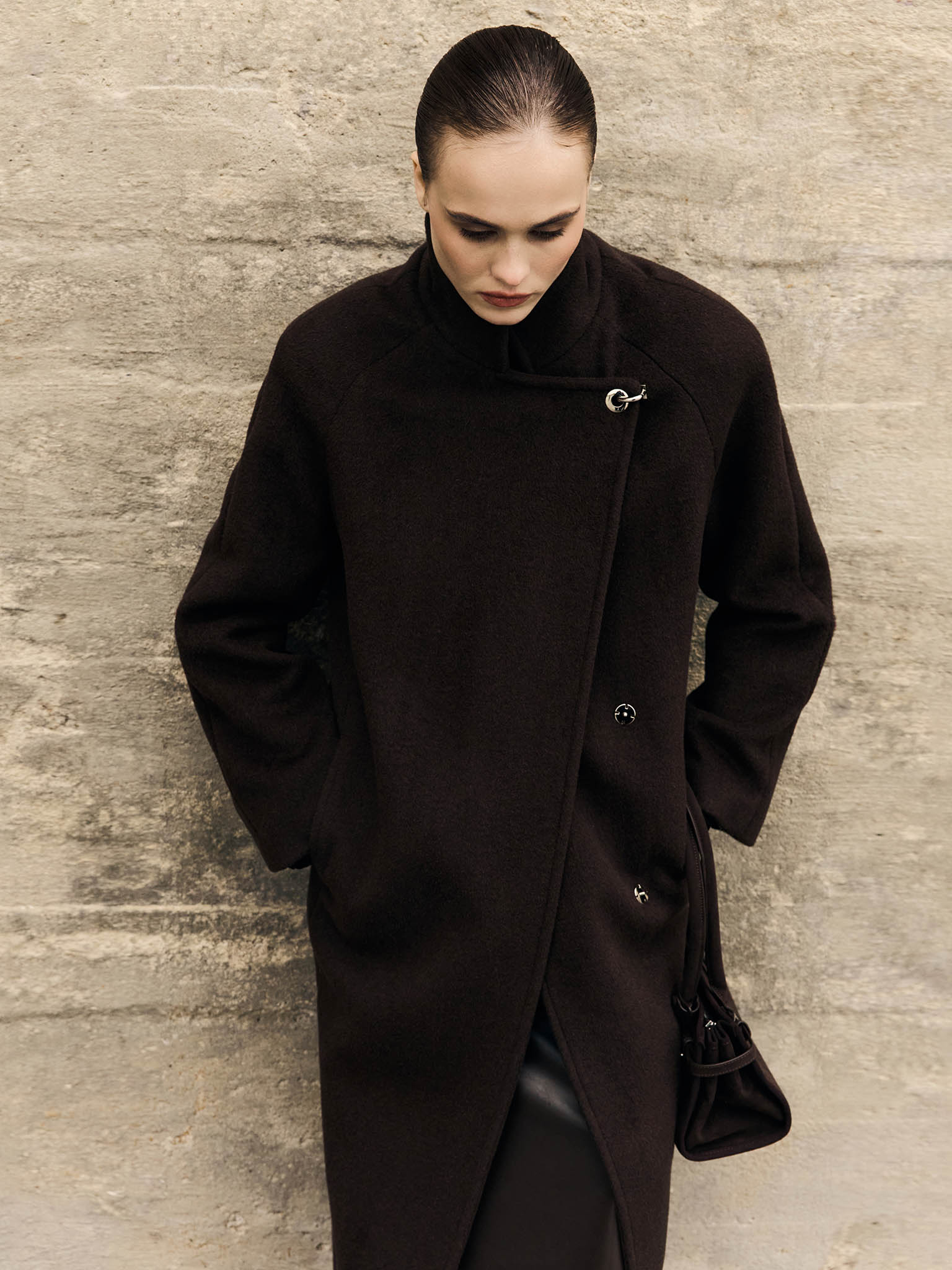 Woollen maxi coat with metal clasp at the shoulder