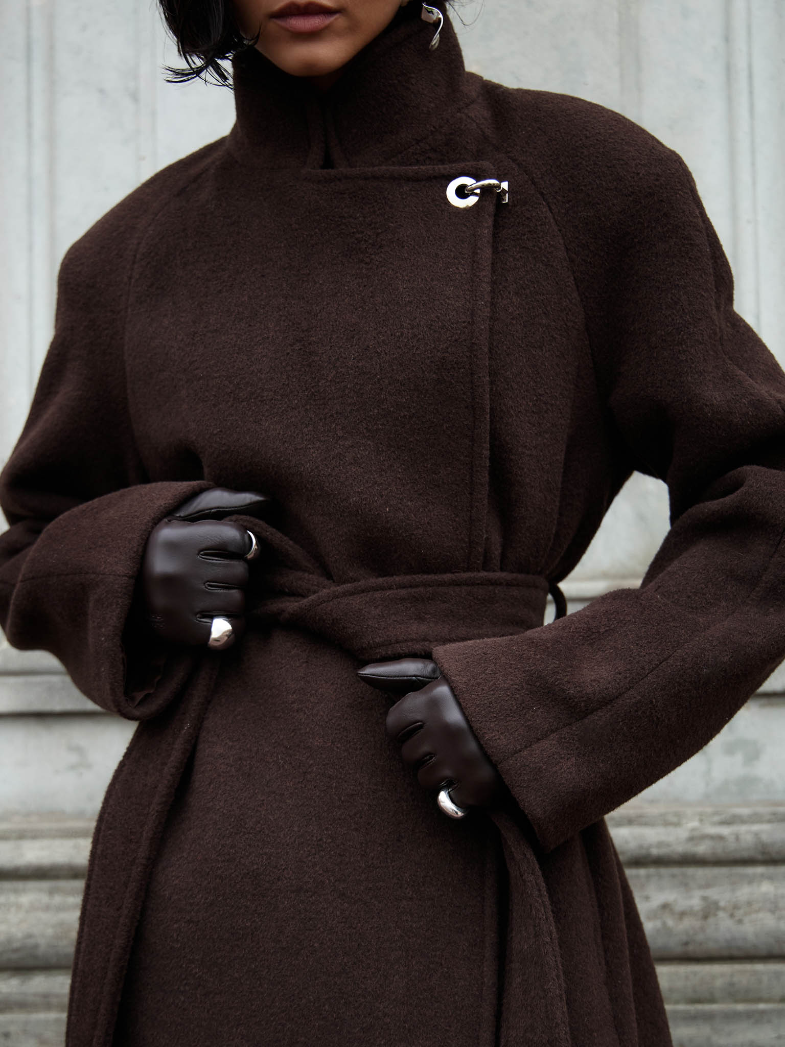 Woollen maxi coat with metal clasp at the shoulder