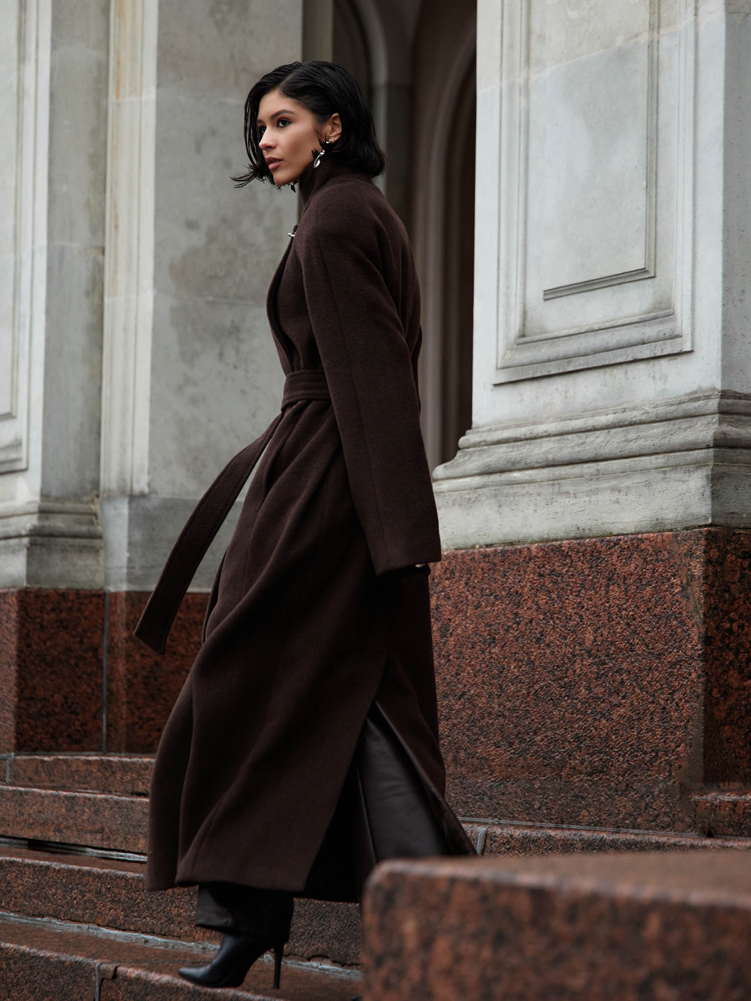 Woollen maxi coat with metal clasp at the shoulder