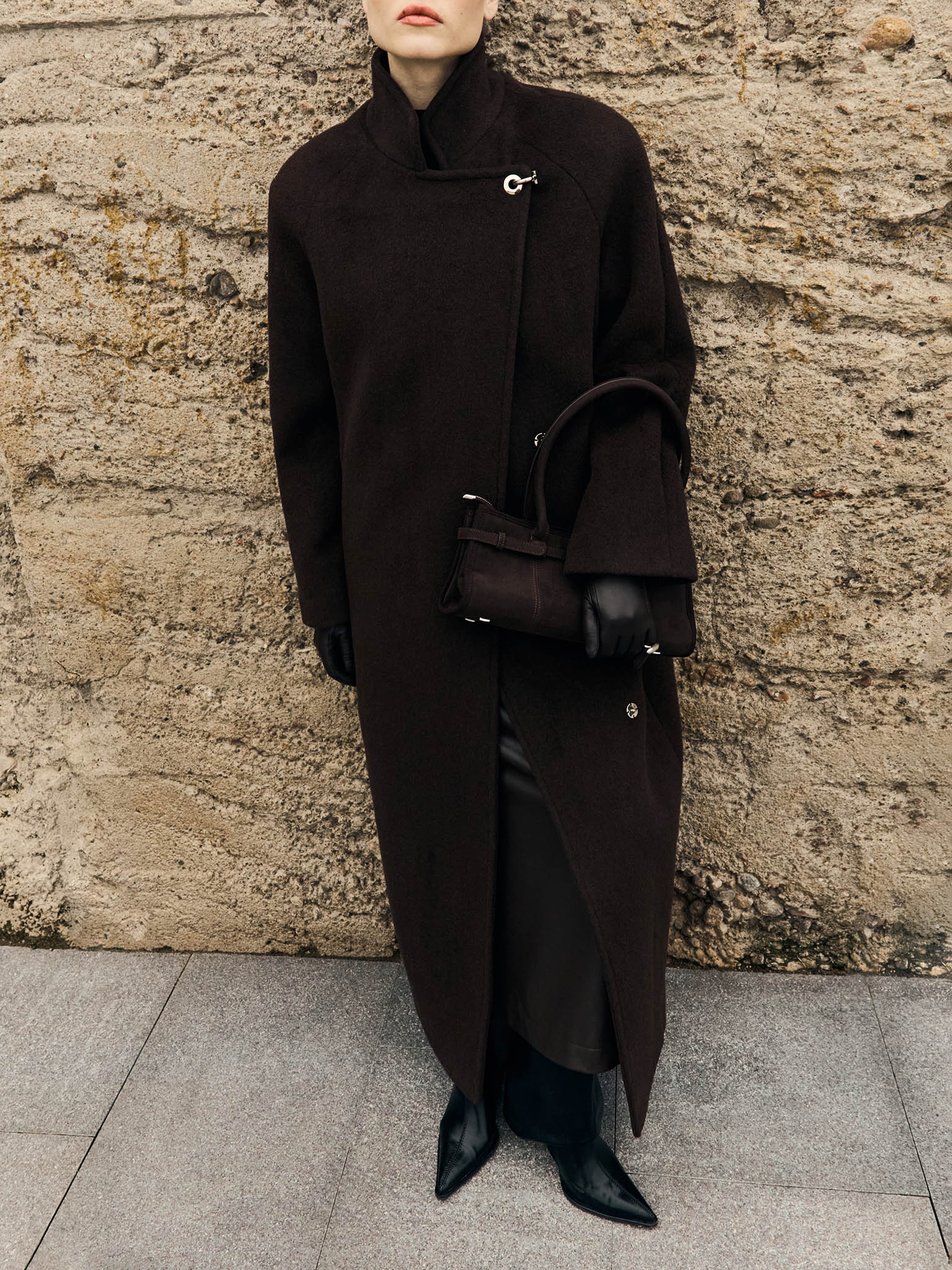 Woollen maxi coat with metal clasp at the shoulder