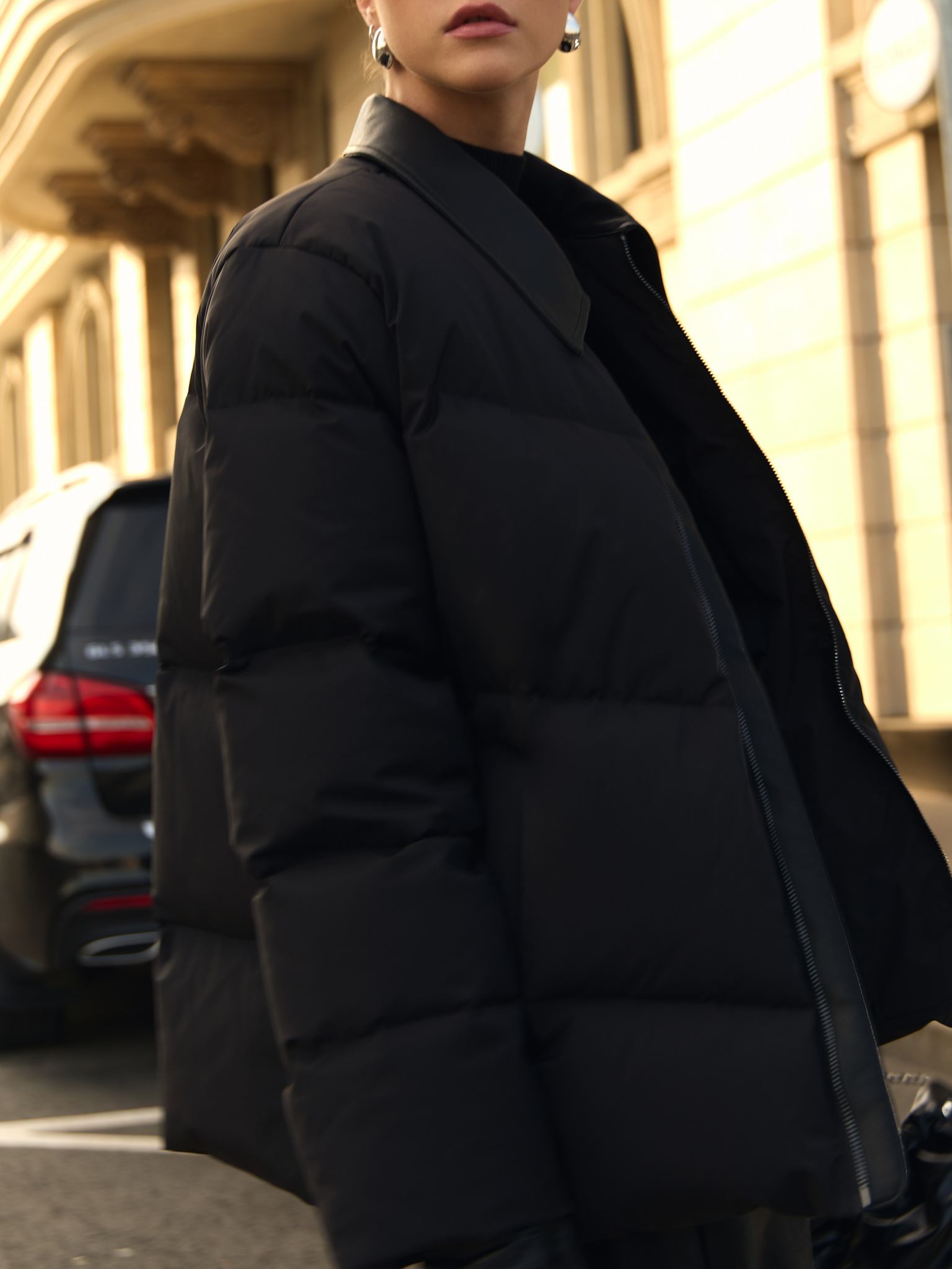 Daunenjacke mit Eco-Lederkragen