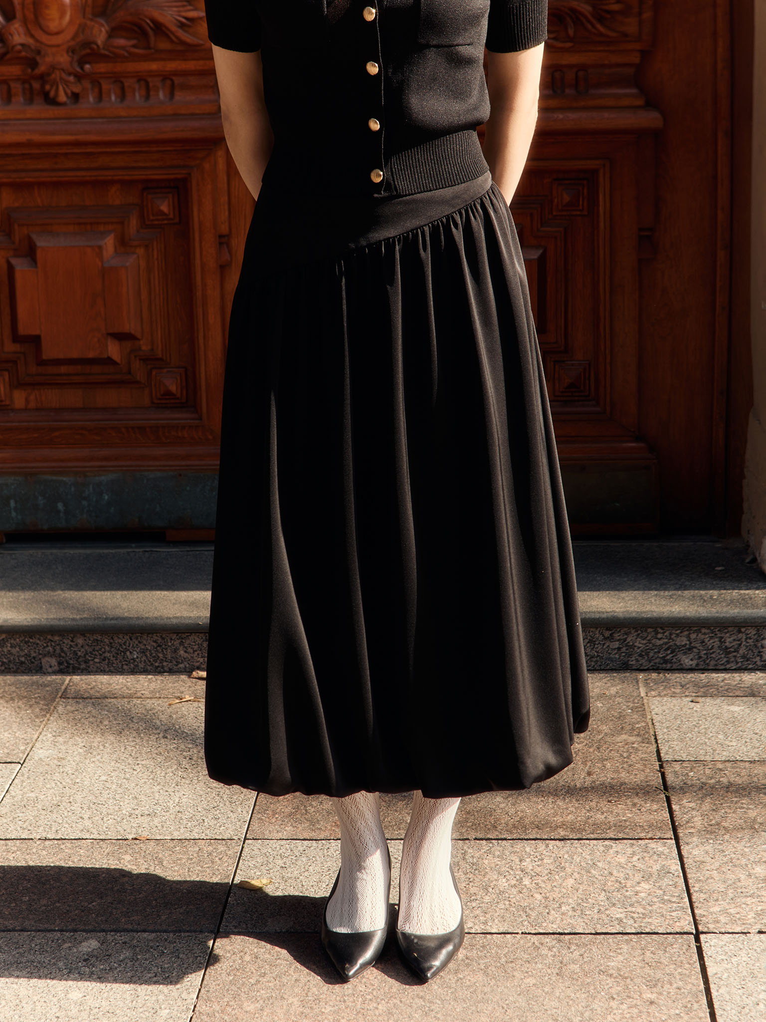 Balloon midi skirt with asymmetrical waistband