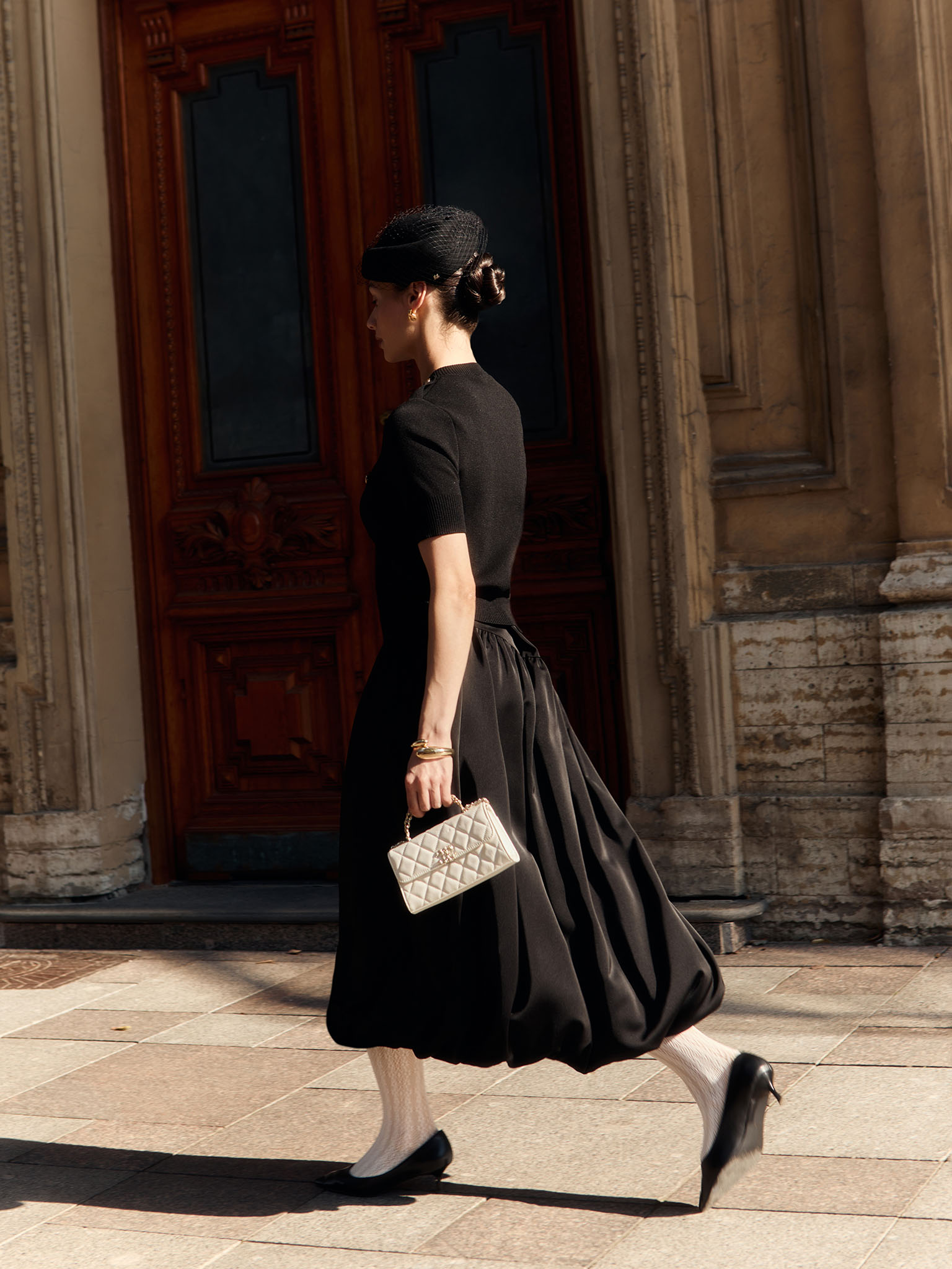 Balloon midi skirt with asymmetrical waistband