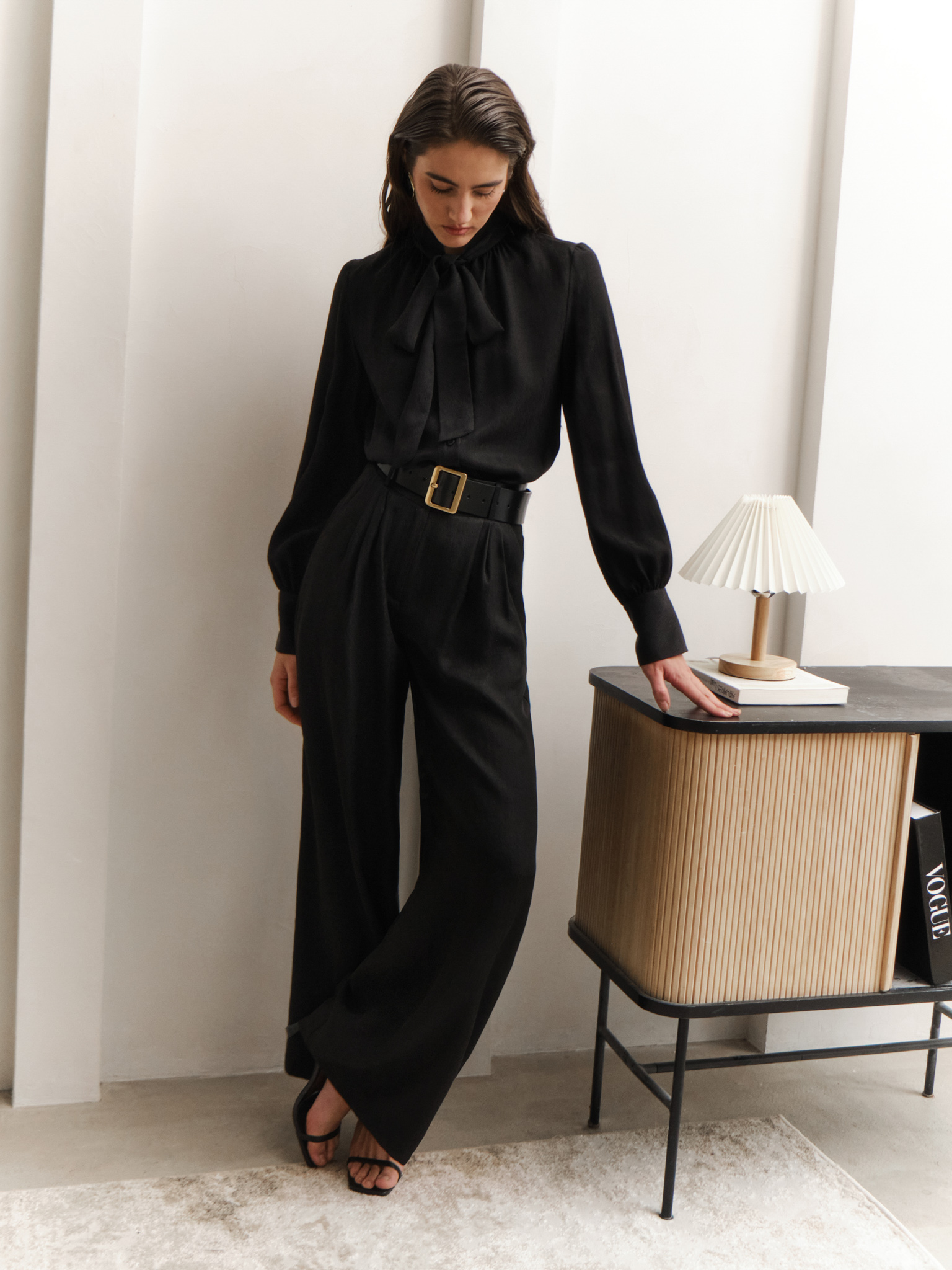 Loose blouse with ribbons on the collar