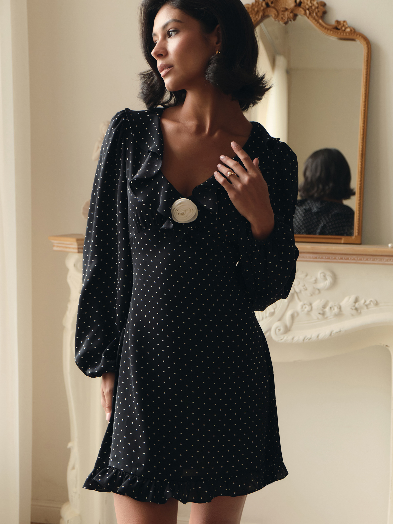 Mini polka-dot dress with contrasting flower
