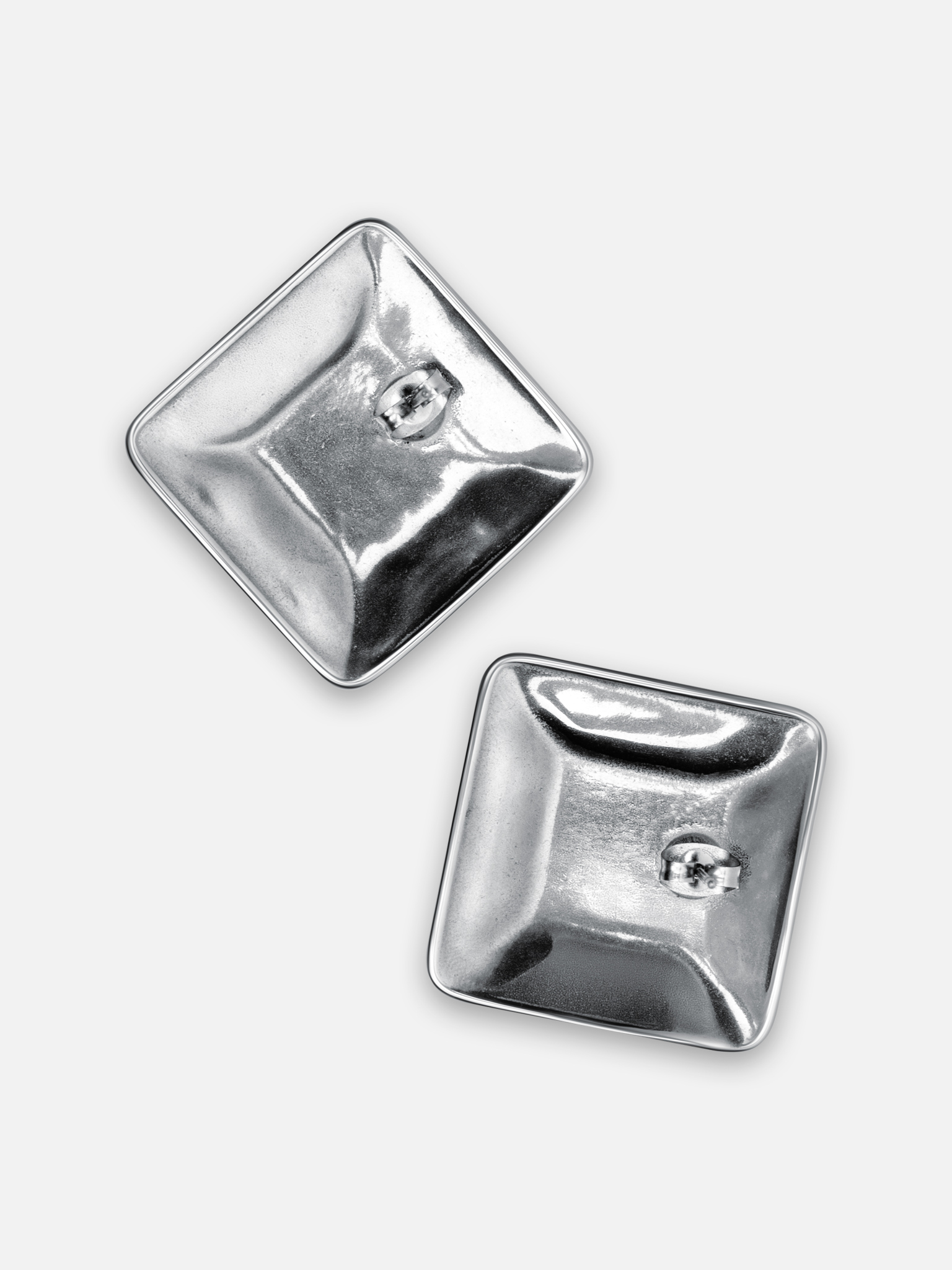 Square stud earrings in glossy metal