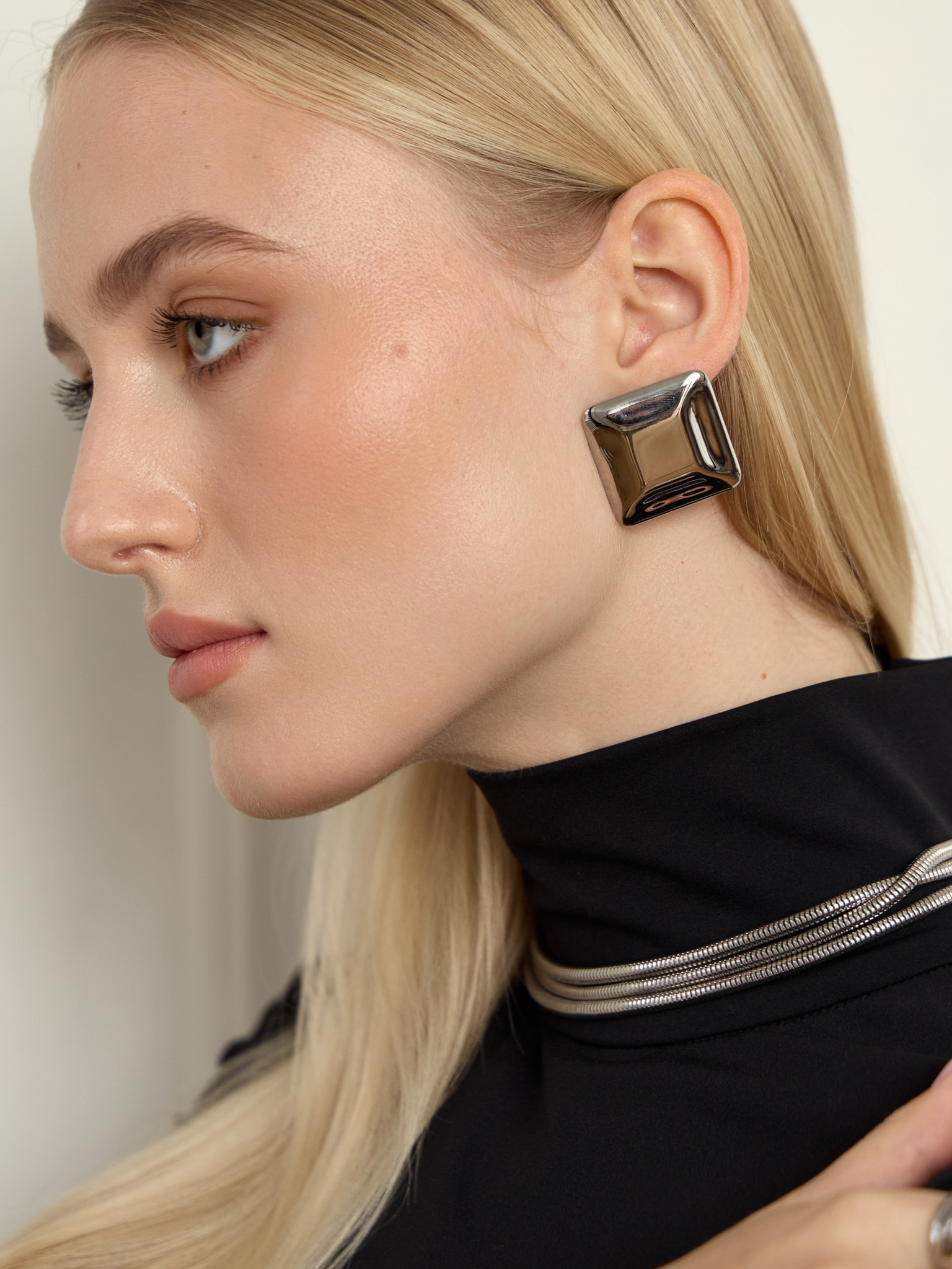 Square stud earrings in glossy metal