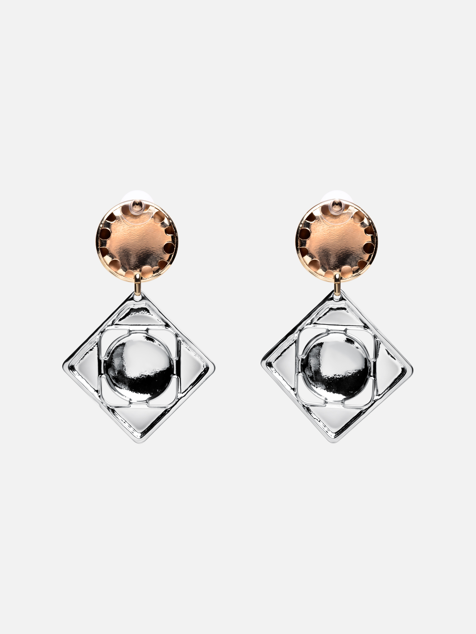 Geometric stud earrings in two metals