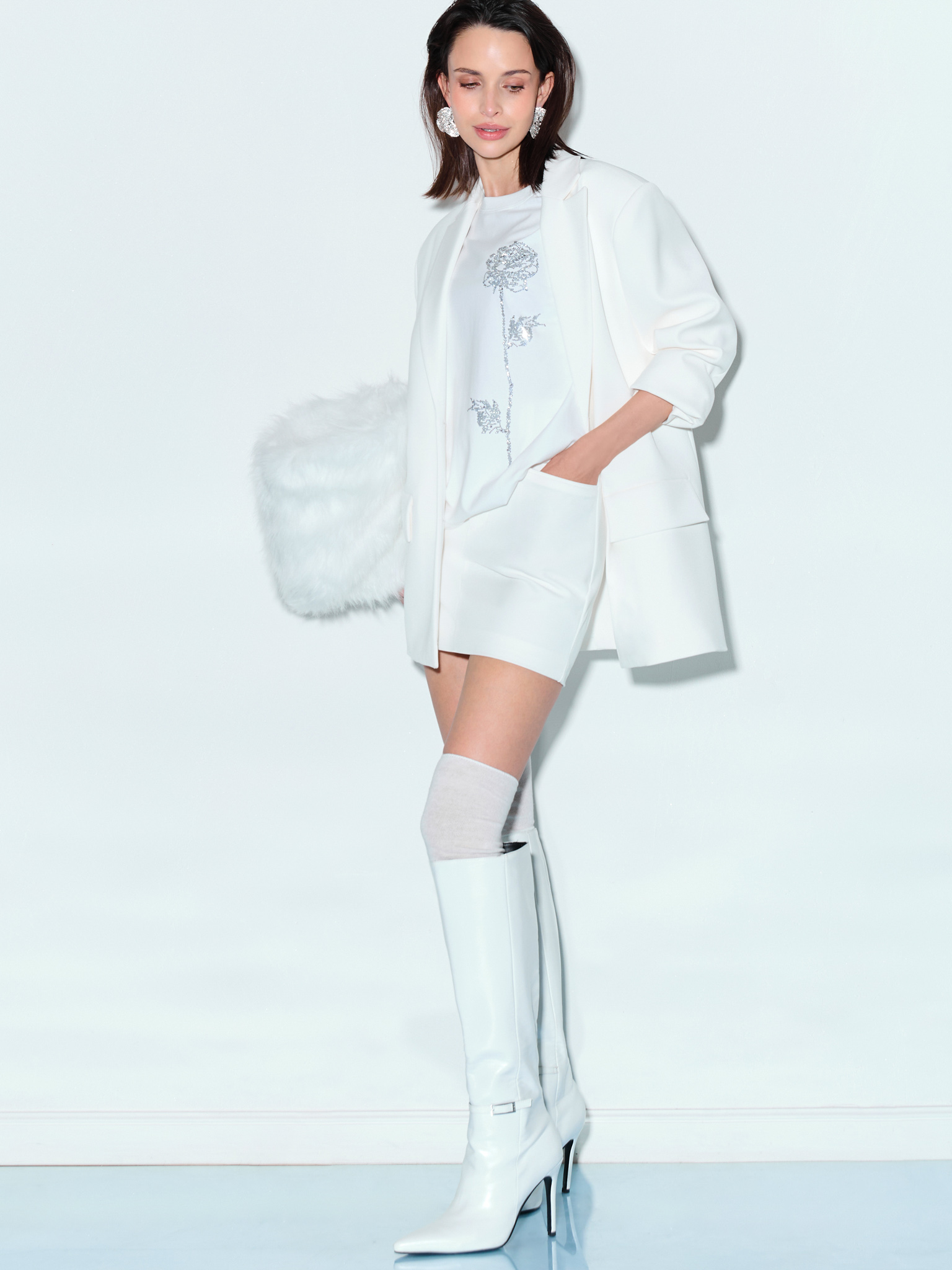 Single-breasted jacket with accent buttons and feathers