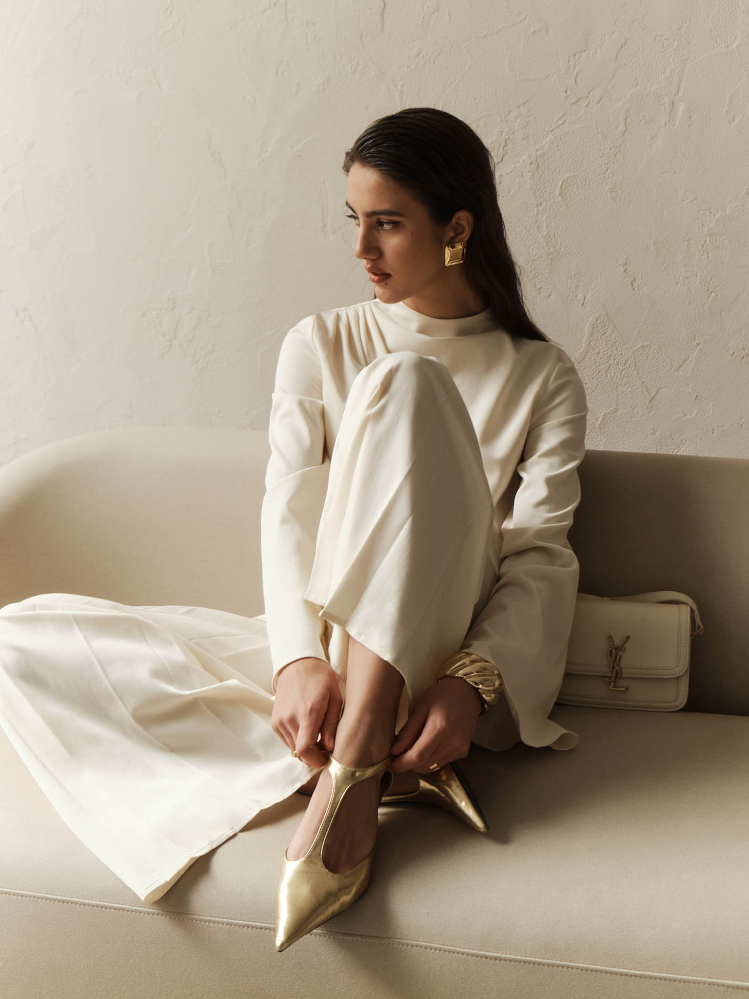 Blouse with draped shoulder and voluminous sleeves