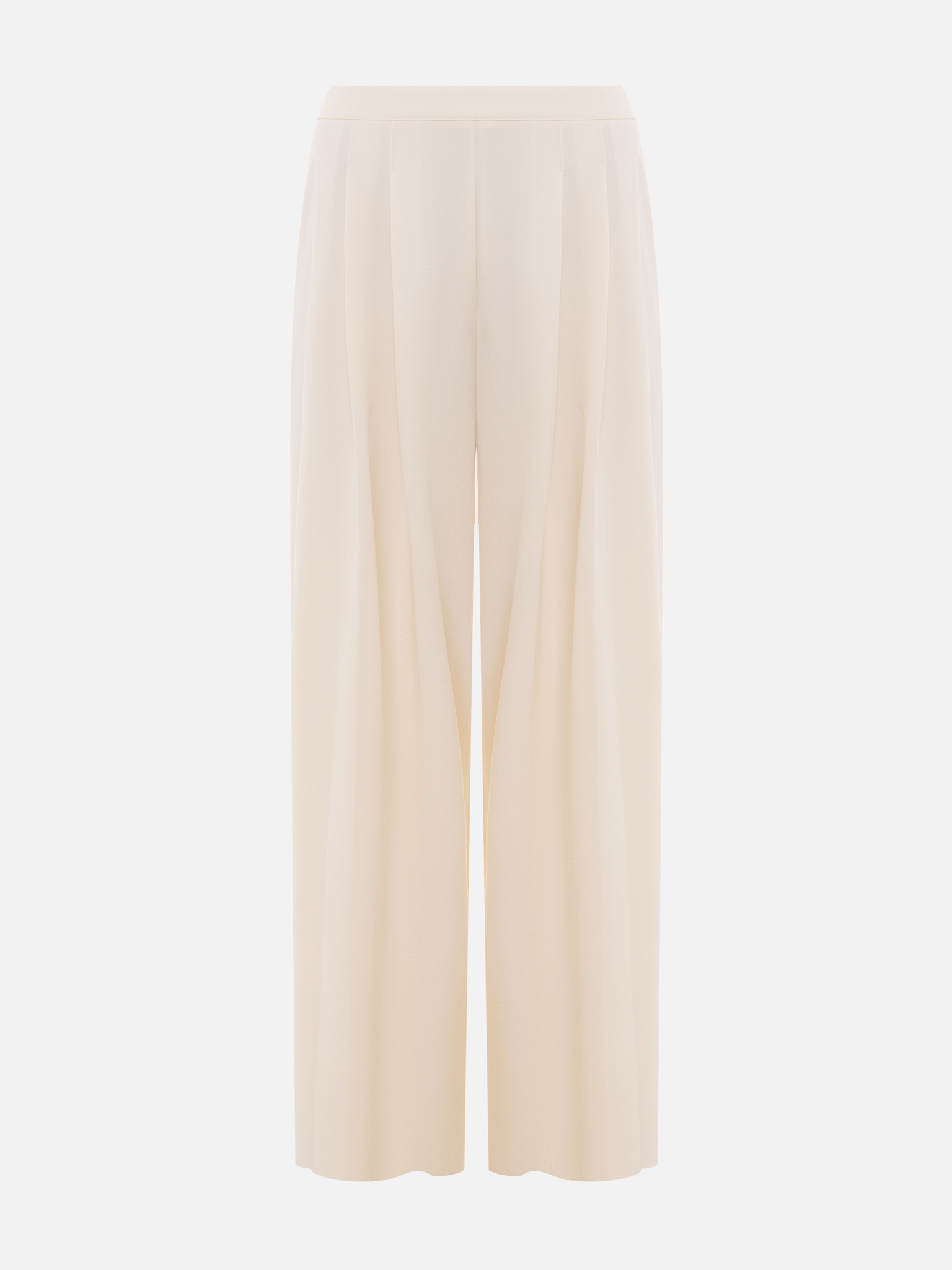 Loose-fitting trousers with large pleats on the waistband