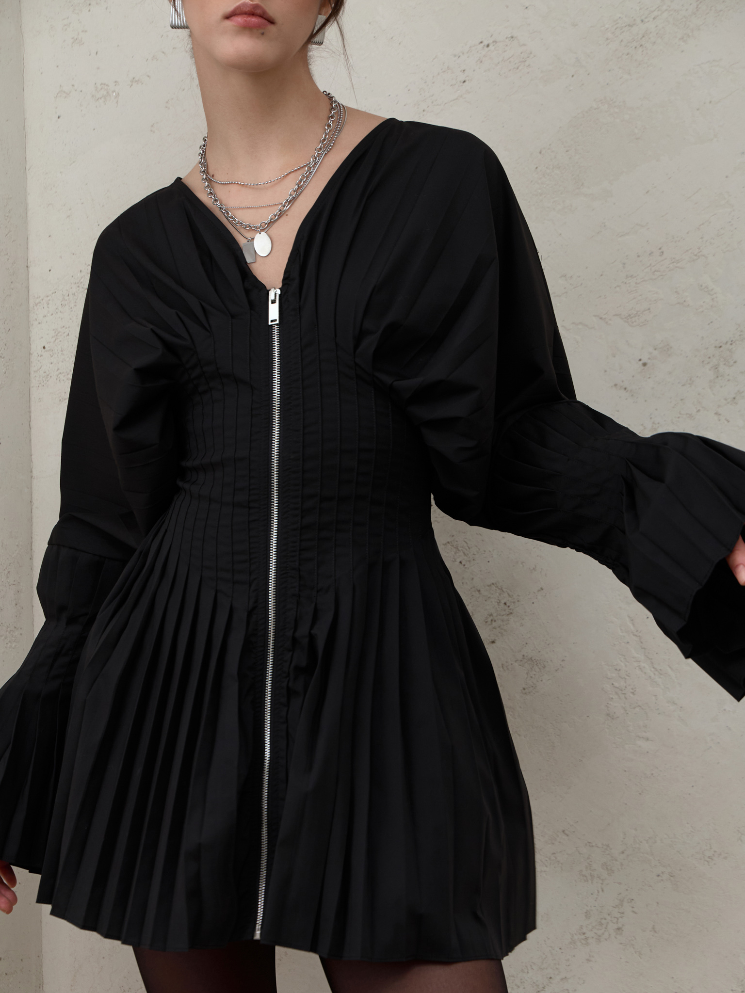 Mini dress with pleating and front zip