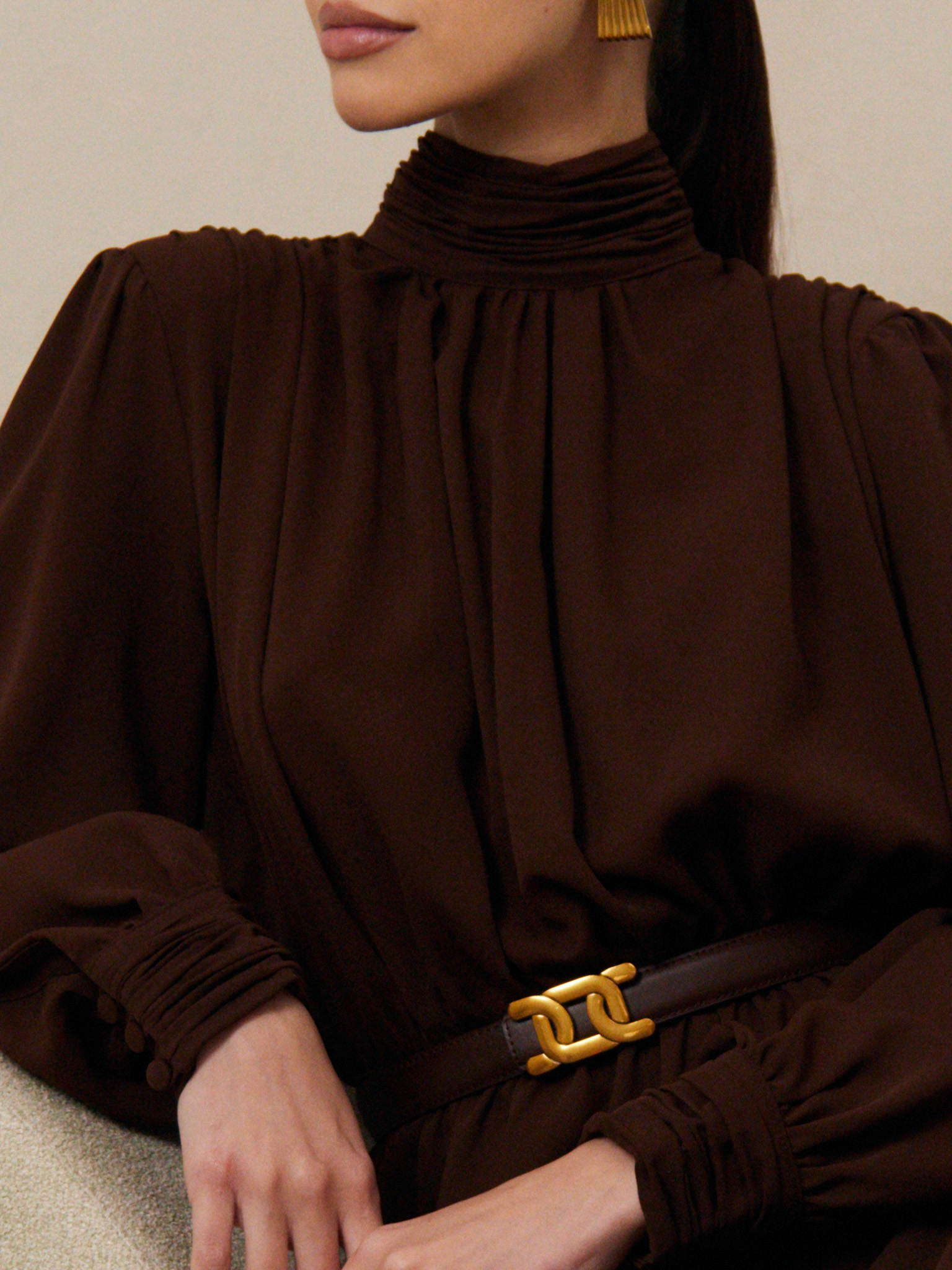 Mini dress with pleats on the shoulders and open back