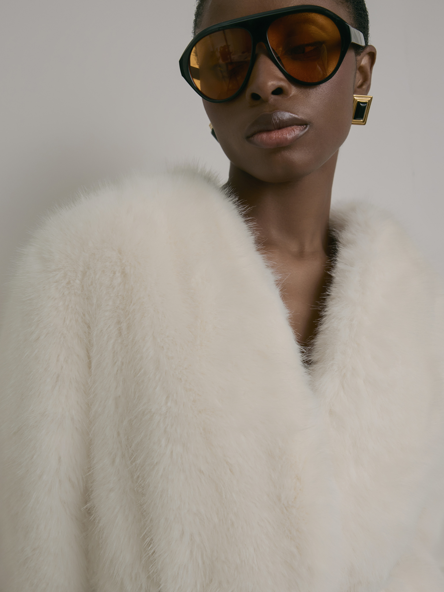 Short eco-fur coat without collar