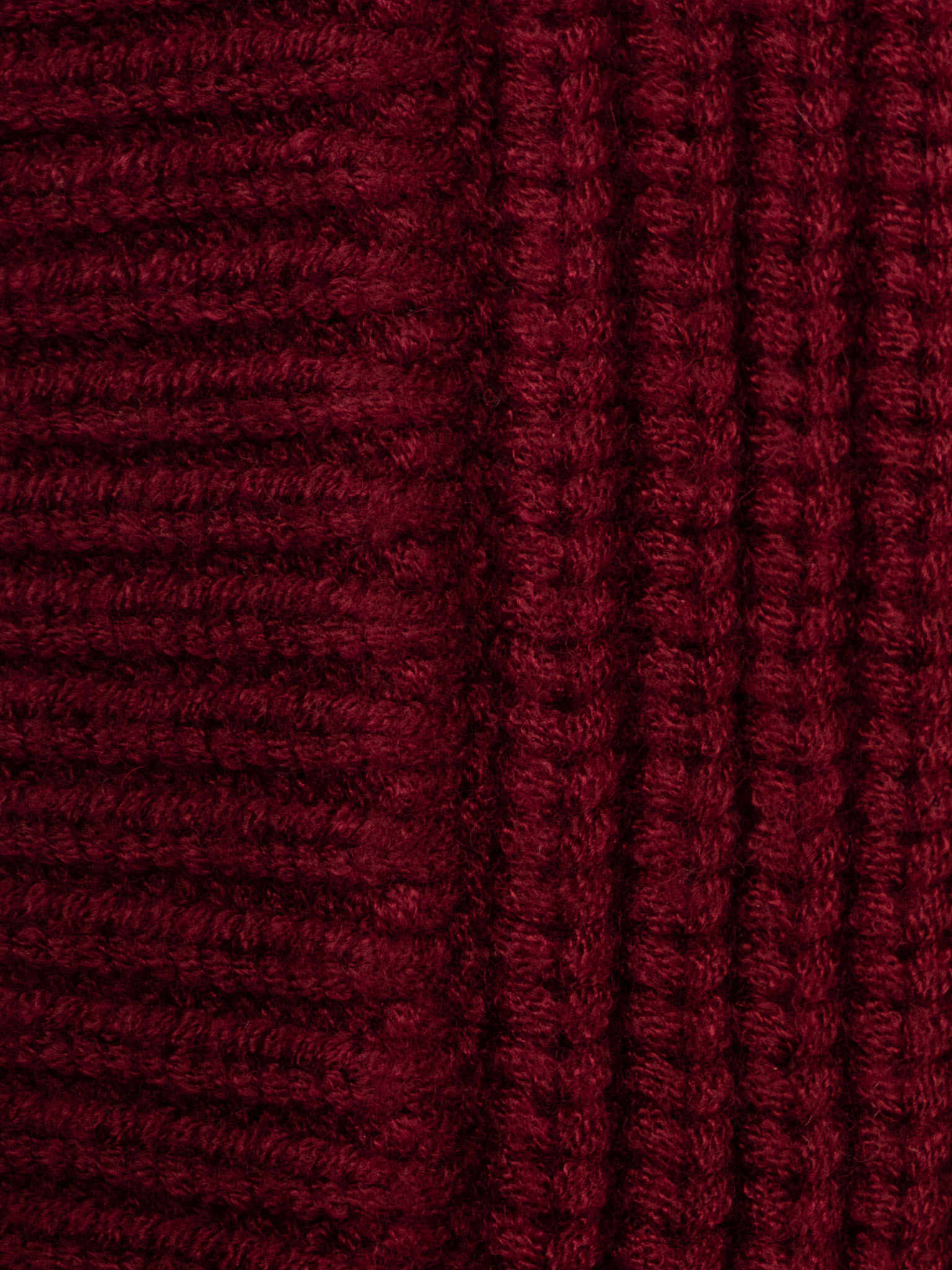 Knitted bonnet with ribbed details