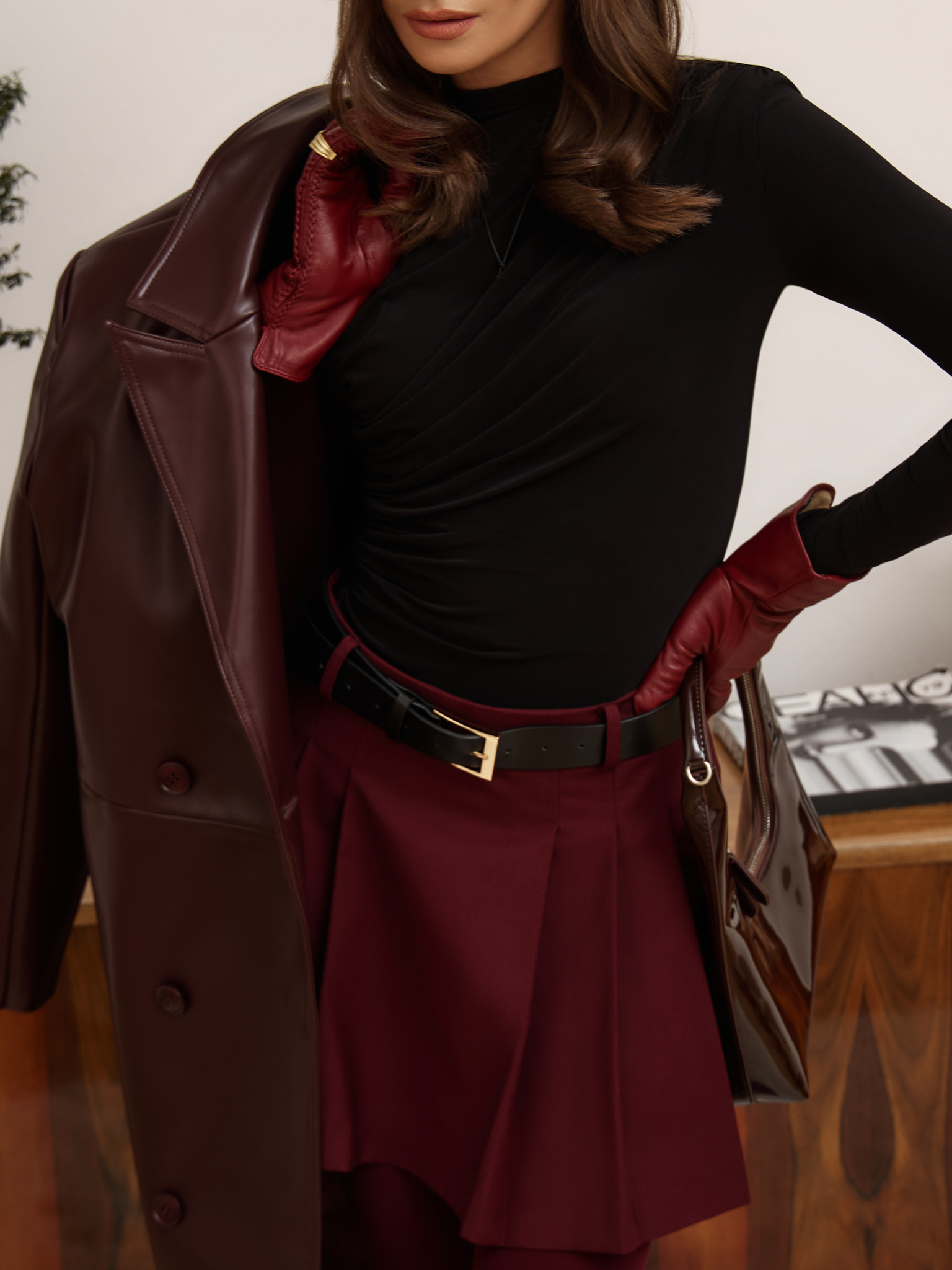 Jersey turtleneck with waist drapery