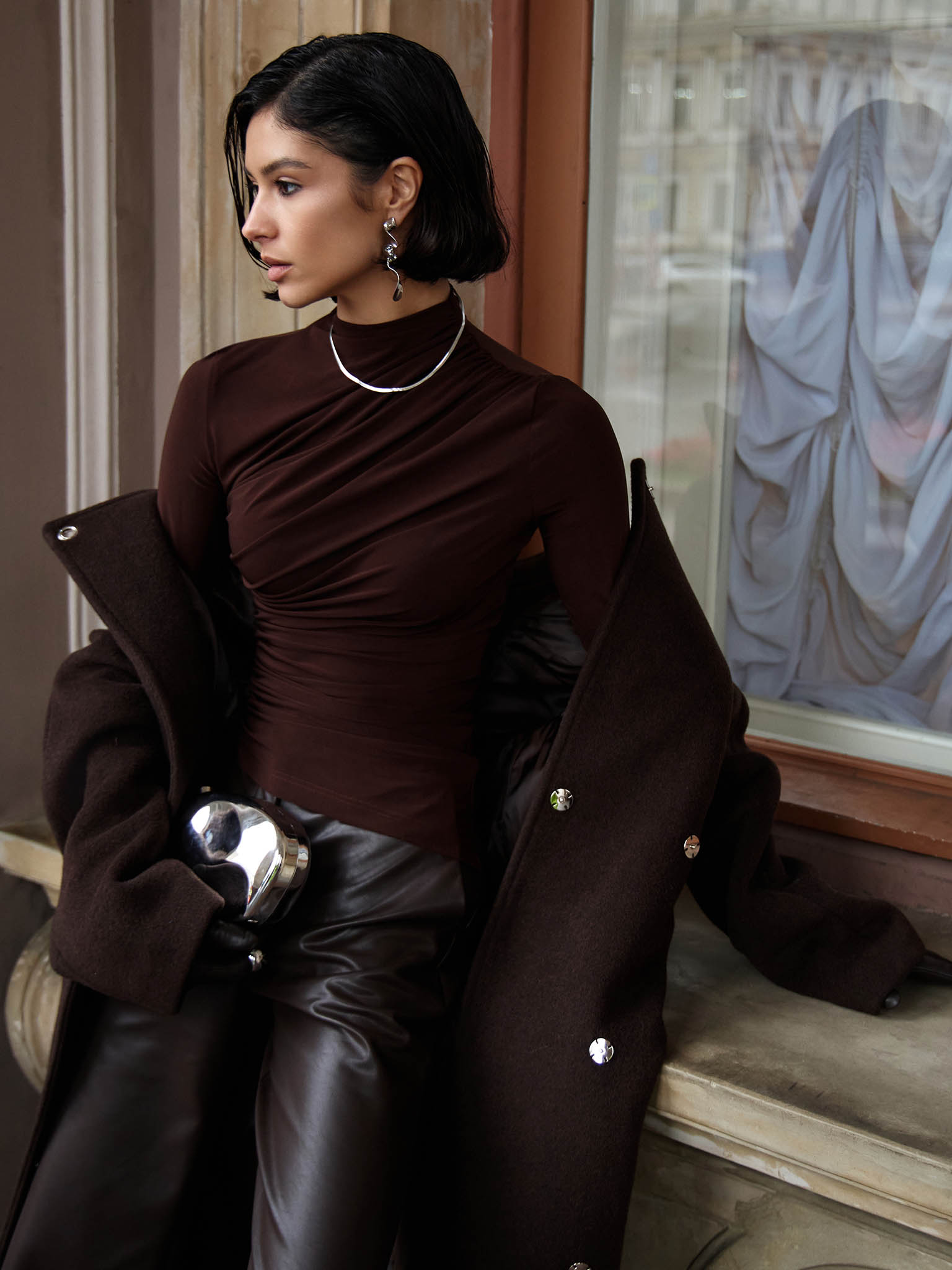 Jersey turtleneck with waist drapery