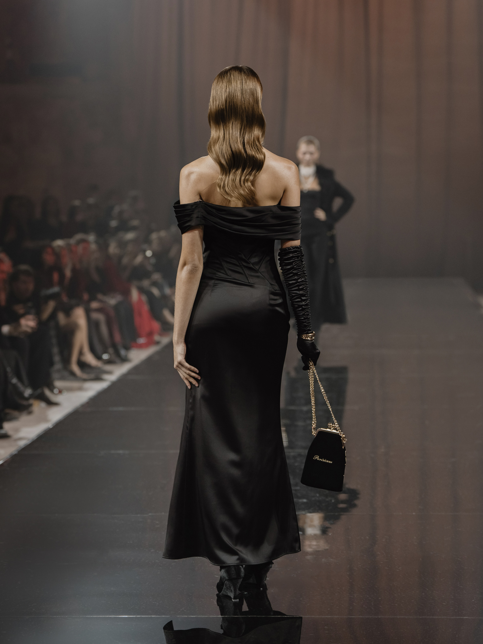 Satin maxi dress with open shoulders and diagonal boning on the bodice