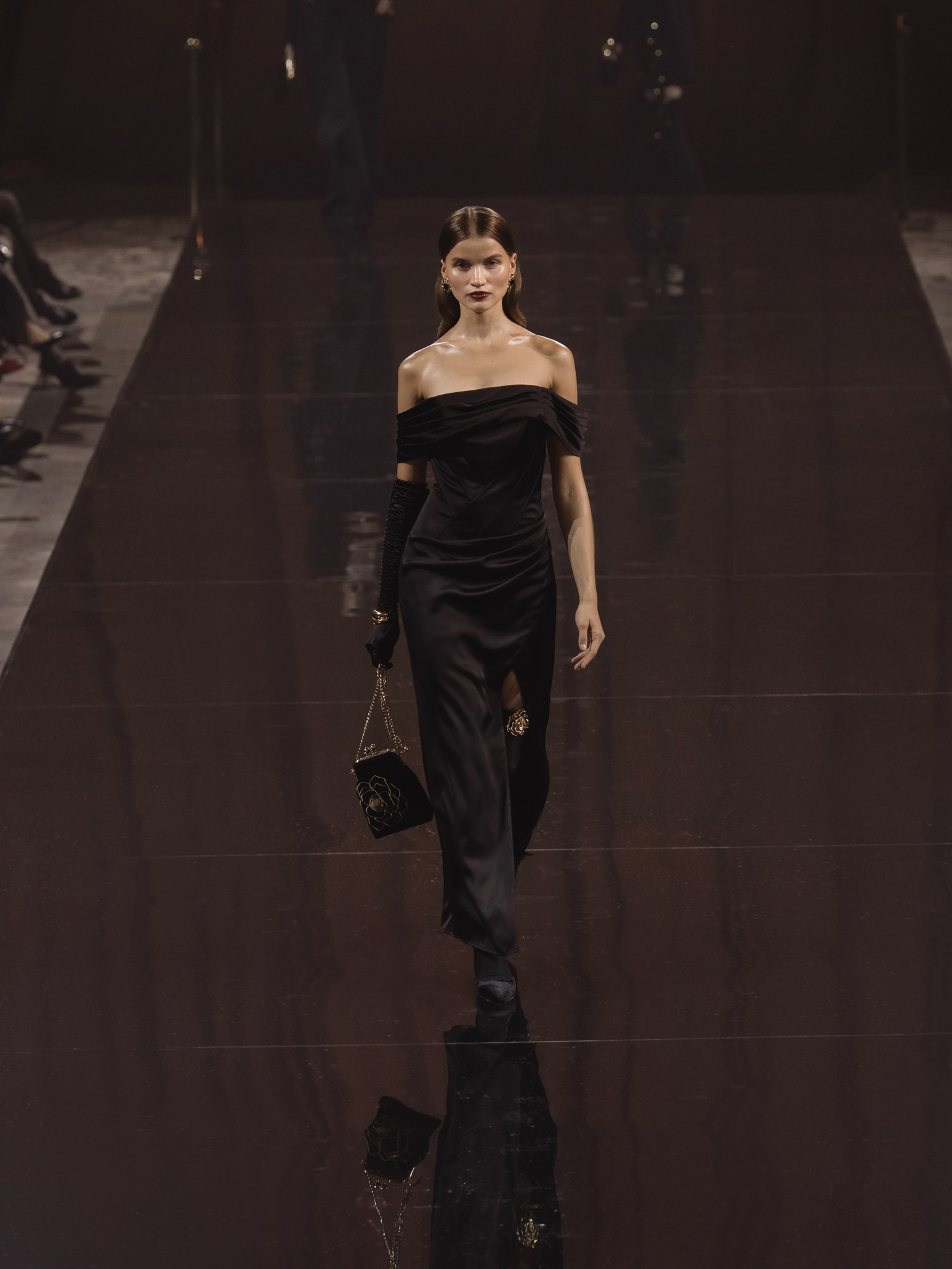 Satin maxi dress with open shoulders and diagonal boning on the bodice