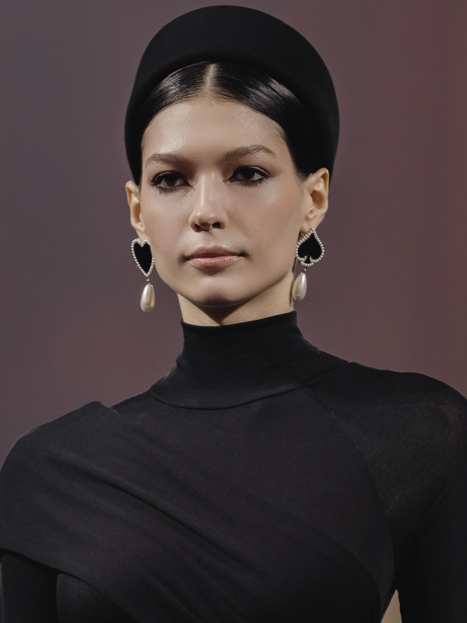 Bodysuit with high collar and draped front