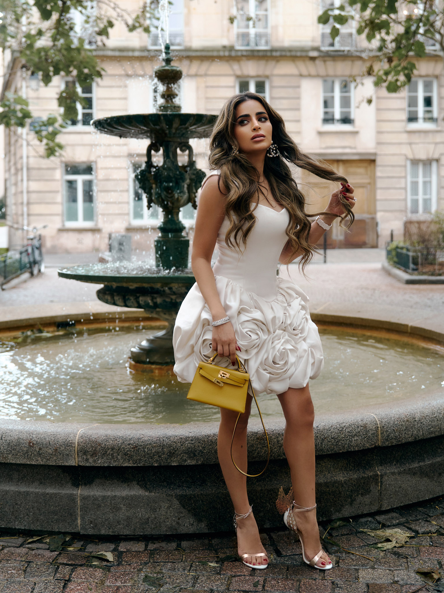 Satin strappy mini dress with voluminous flowers on the skirt