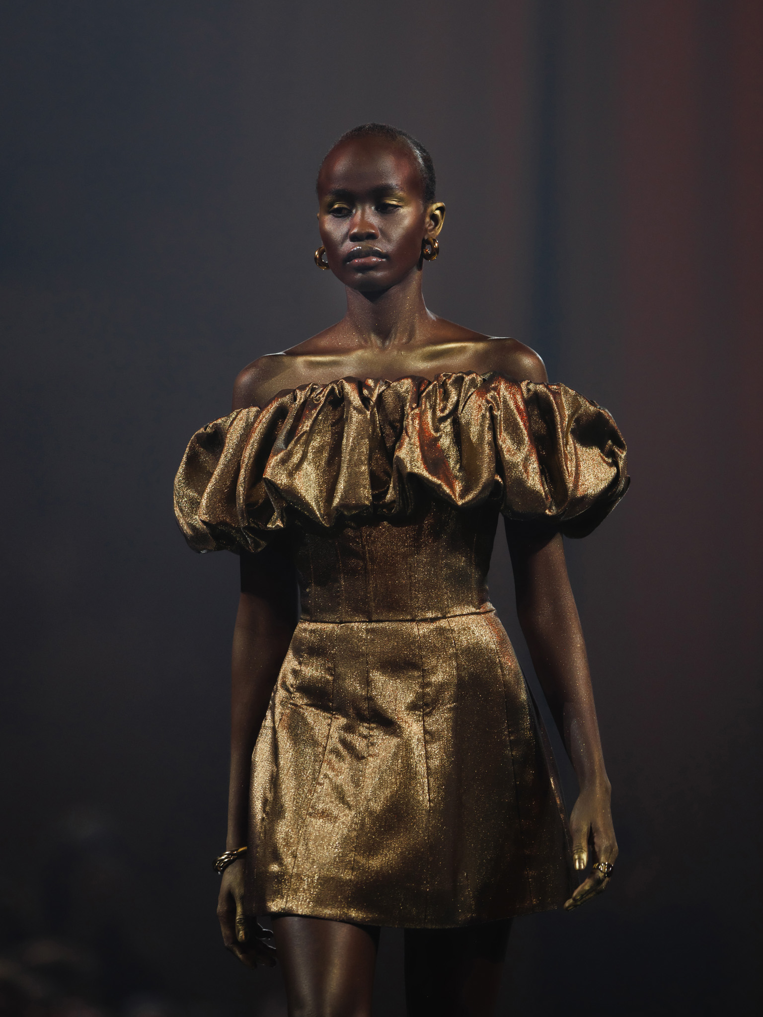 Metallic mini dress with voluminous detail on the bodice