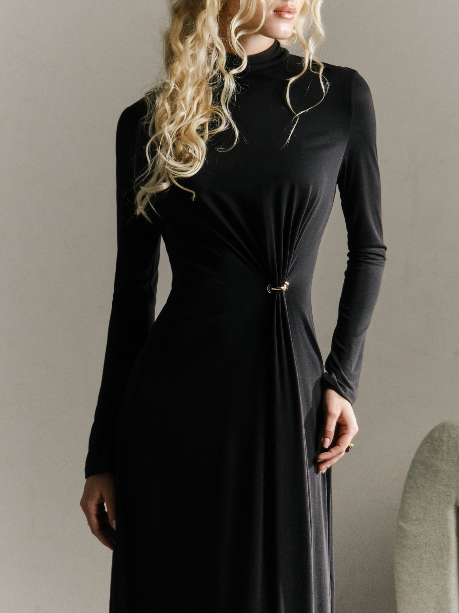 Jersey maxi dress with metallic decor at the waist