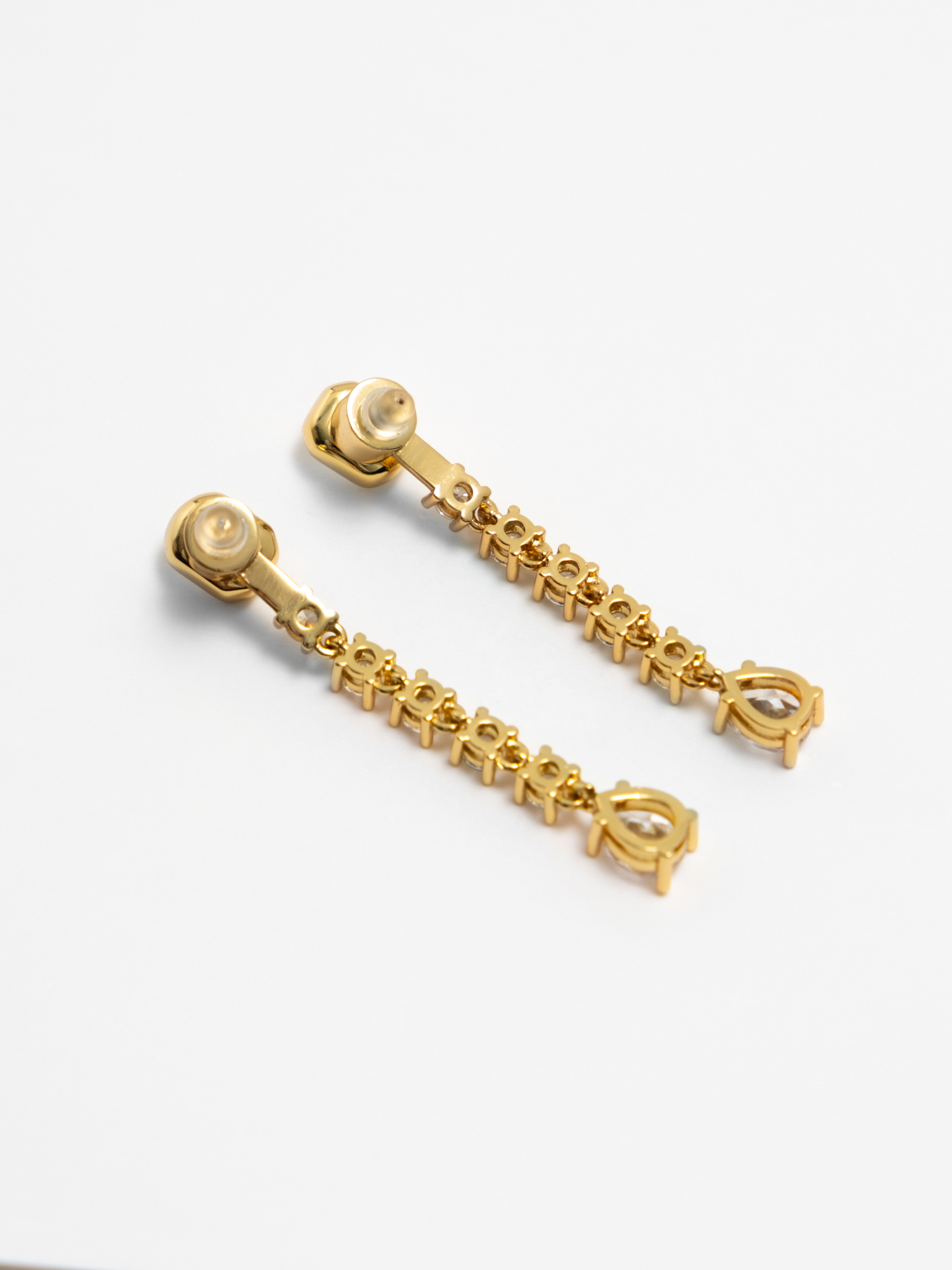 Long stud earrings with large zircons