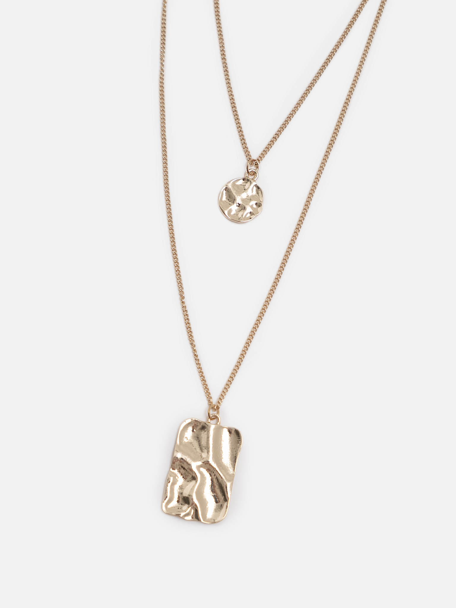 Многоуровневое колье с фактурными подвесками